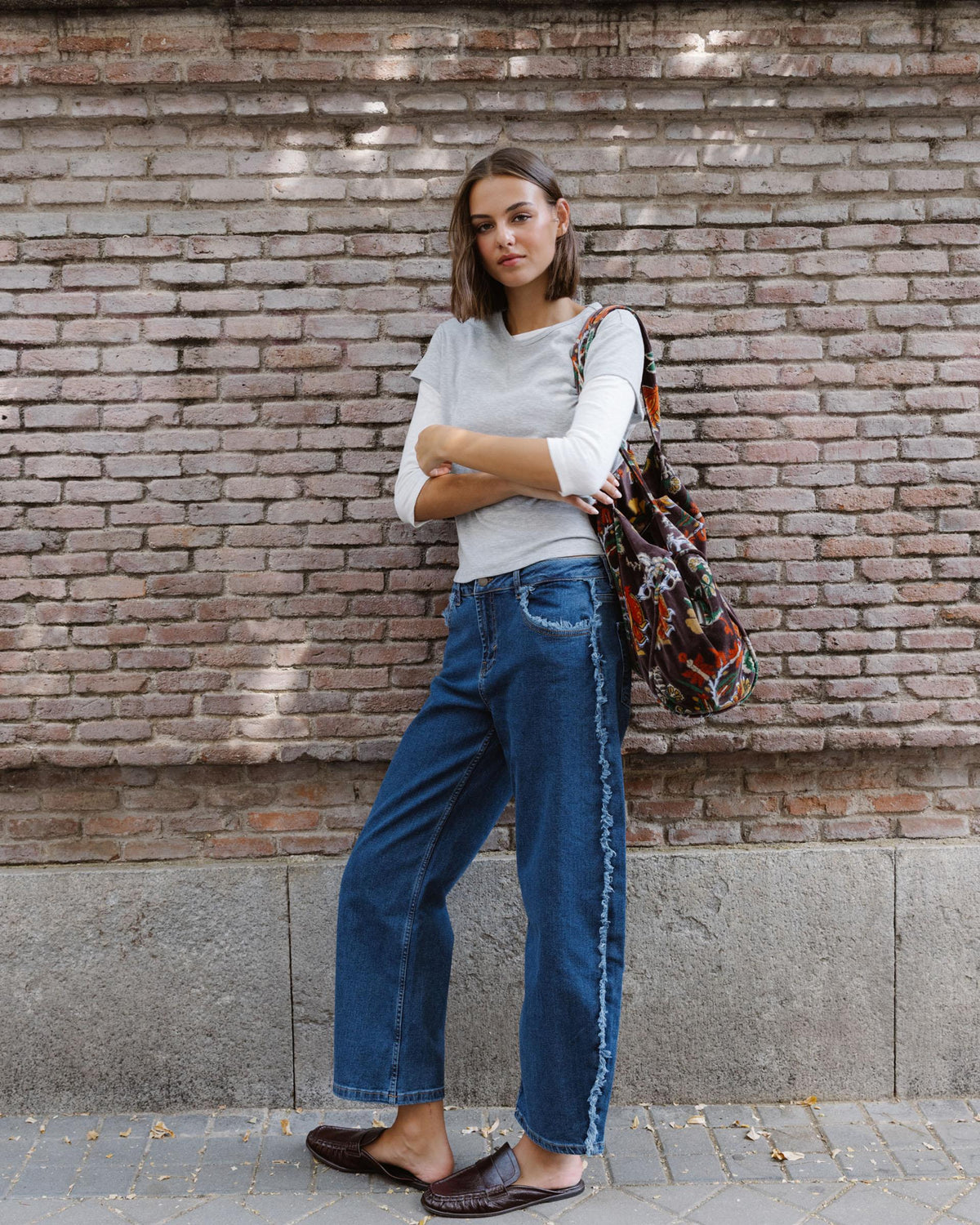 Blue Jeans with Frayed Side Seams