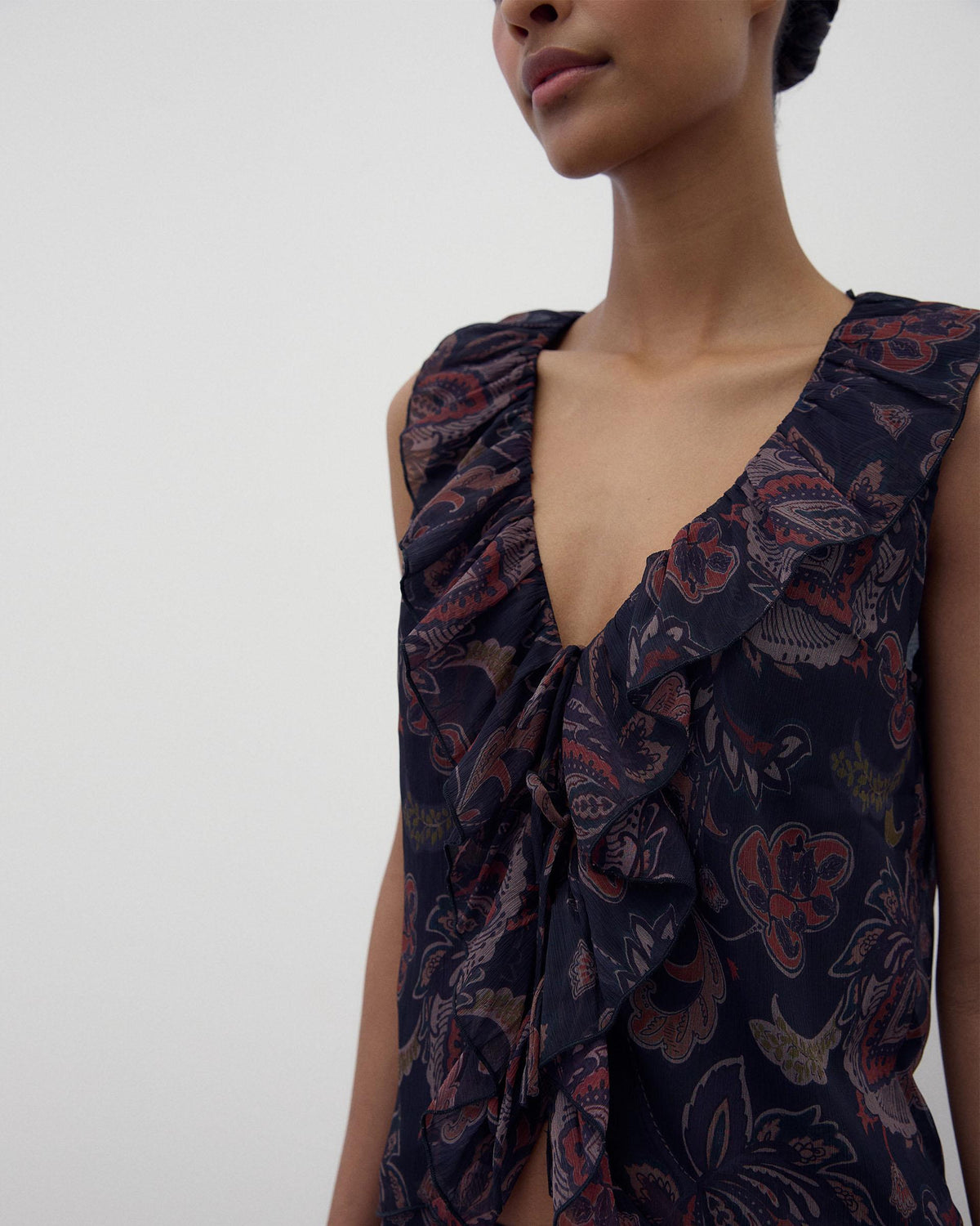 Black Printed Sleeveless Top with Ruffle and Ties