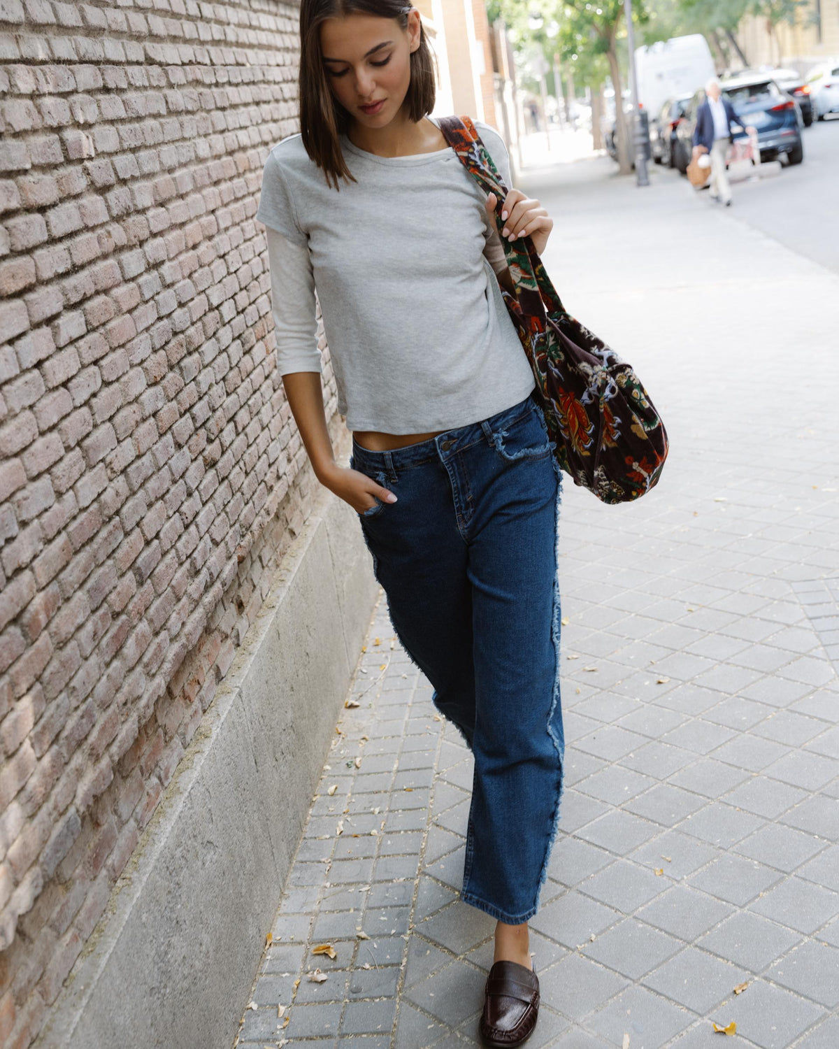 Blue Jeans with Frayed Side Seams