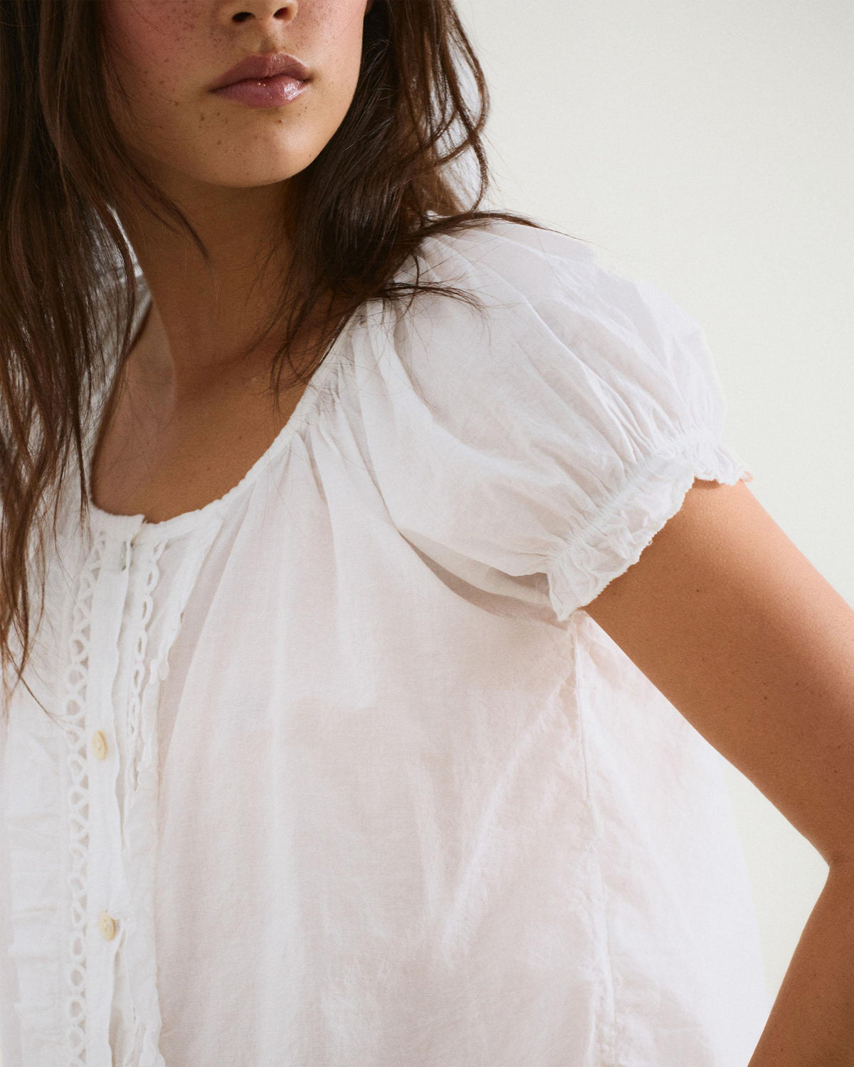 White Buttoned Blouse with Wavy Ruffles