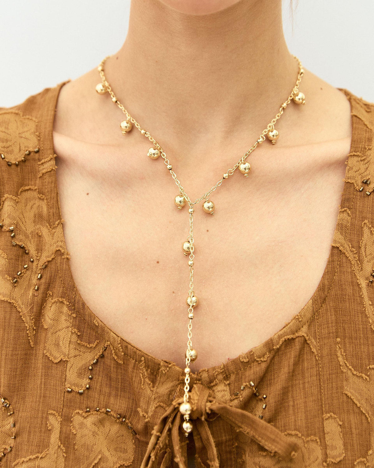 Gold Beaded Lariat Necklace