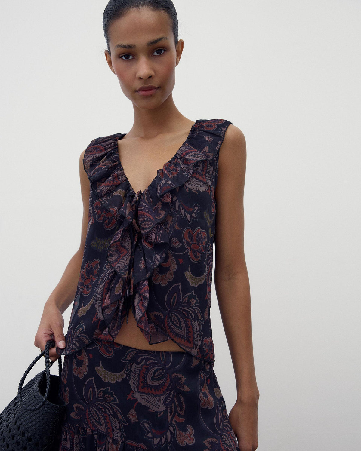 Black Printed Sleeveless Top with Ruffle and Ties
