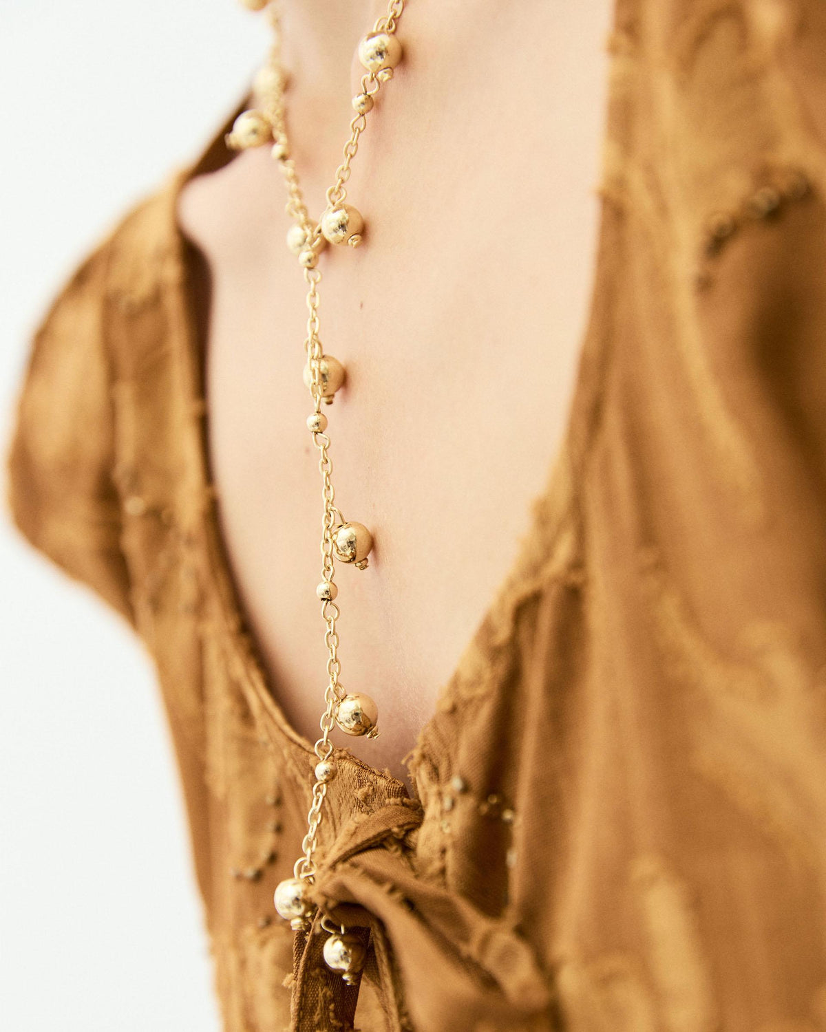 Gold Beaded Lariat Necklace