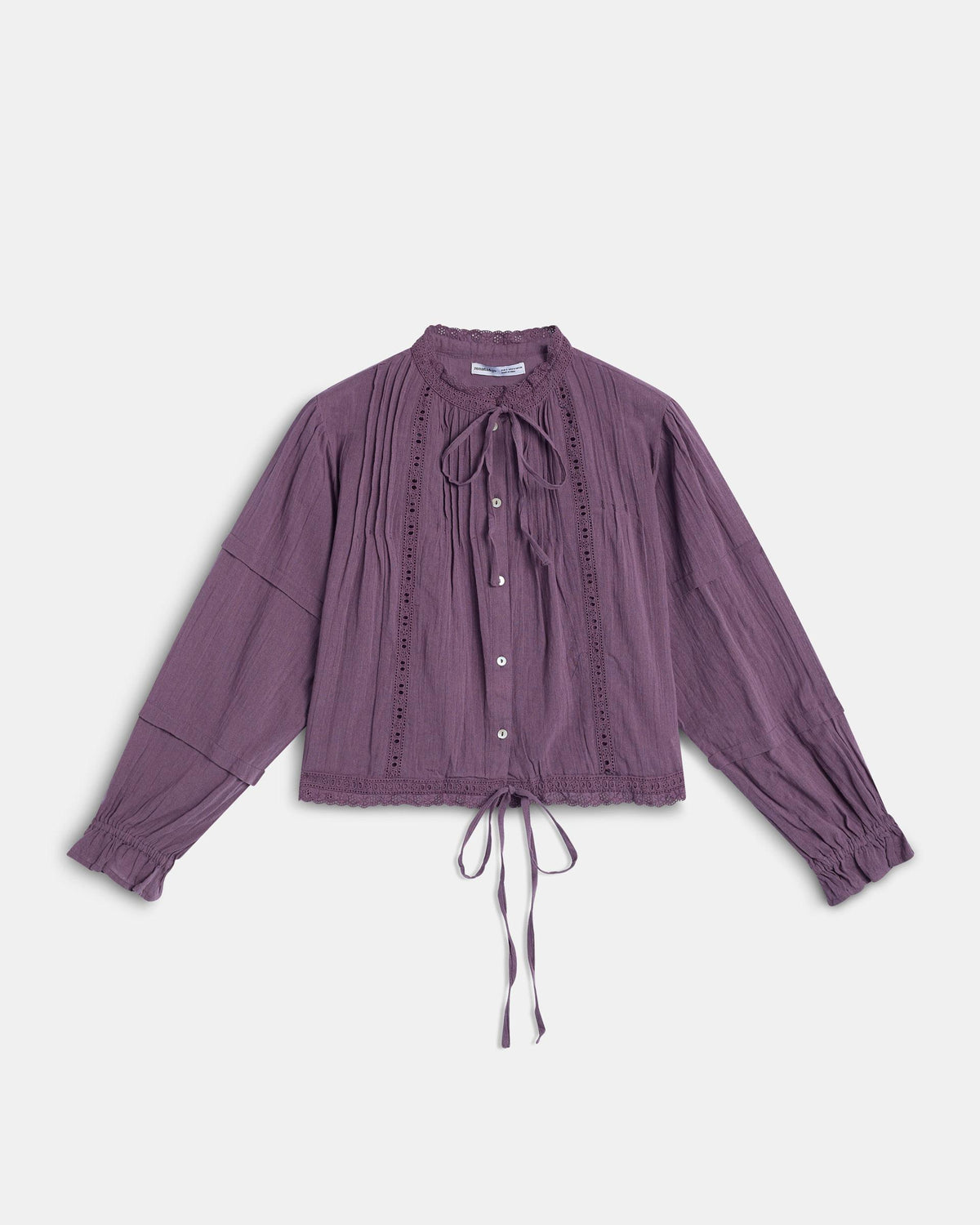 Lila Bluse mit Spitze und Schleifen