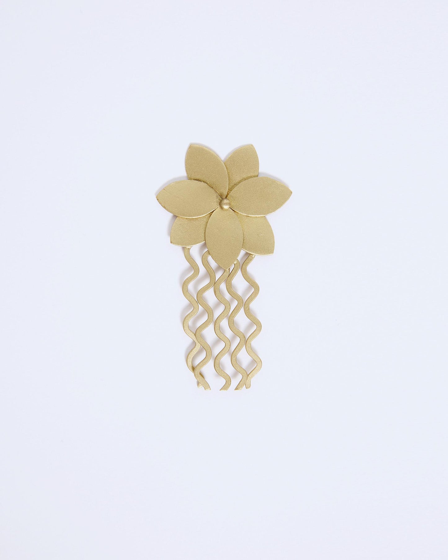 Pente de flor dourada