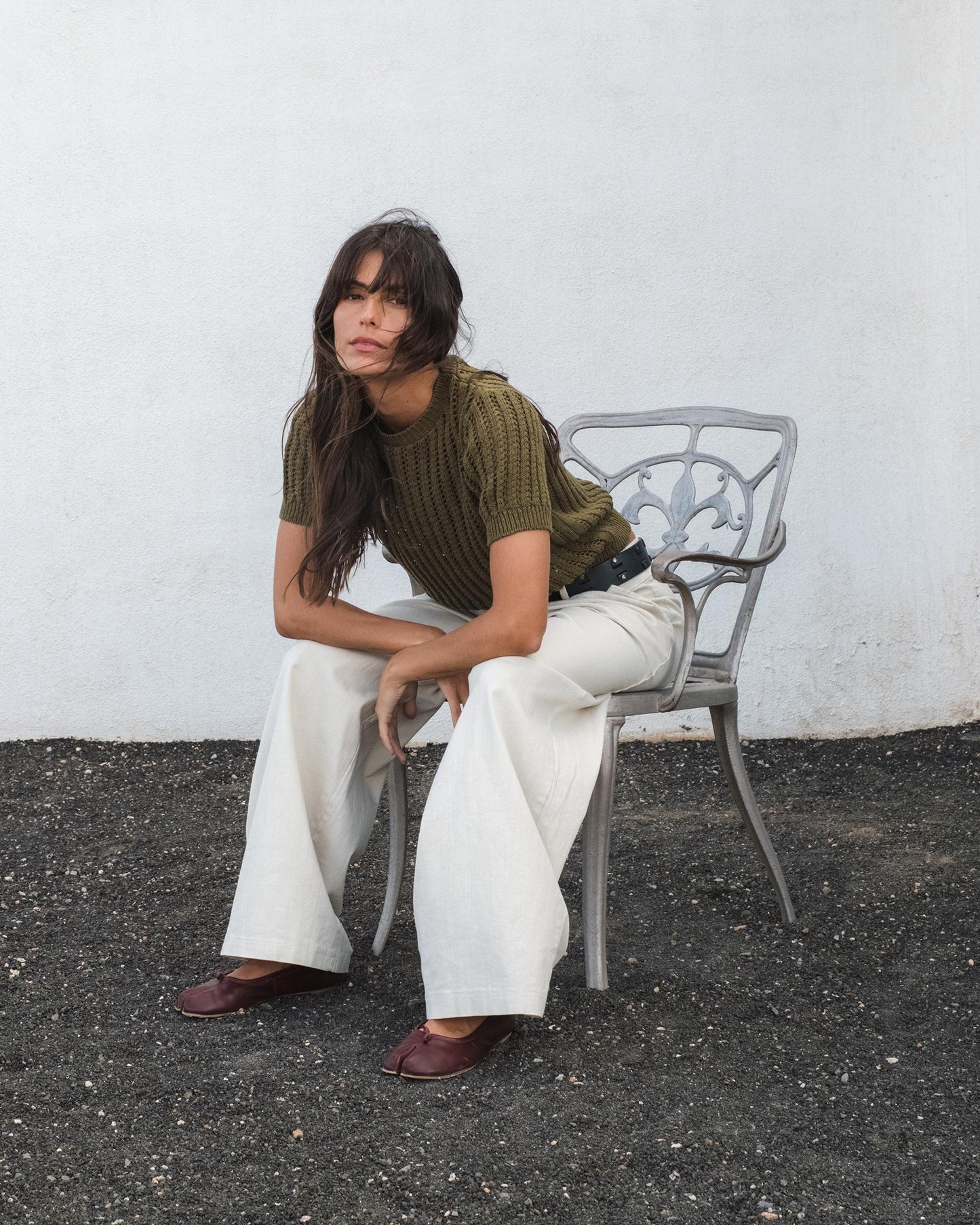 Blusa de malha verde vazada com manga curta