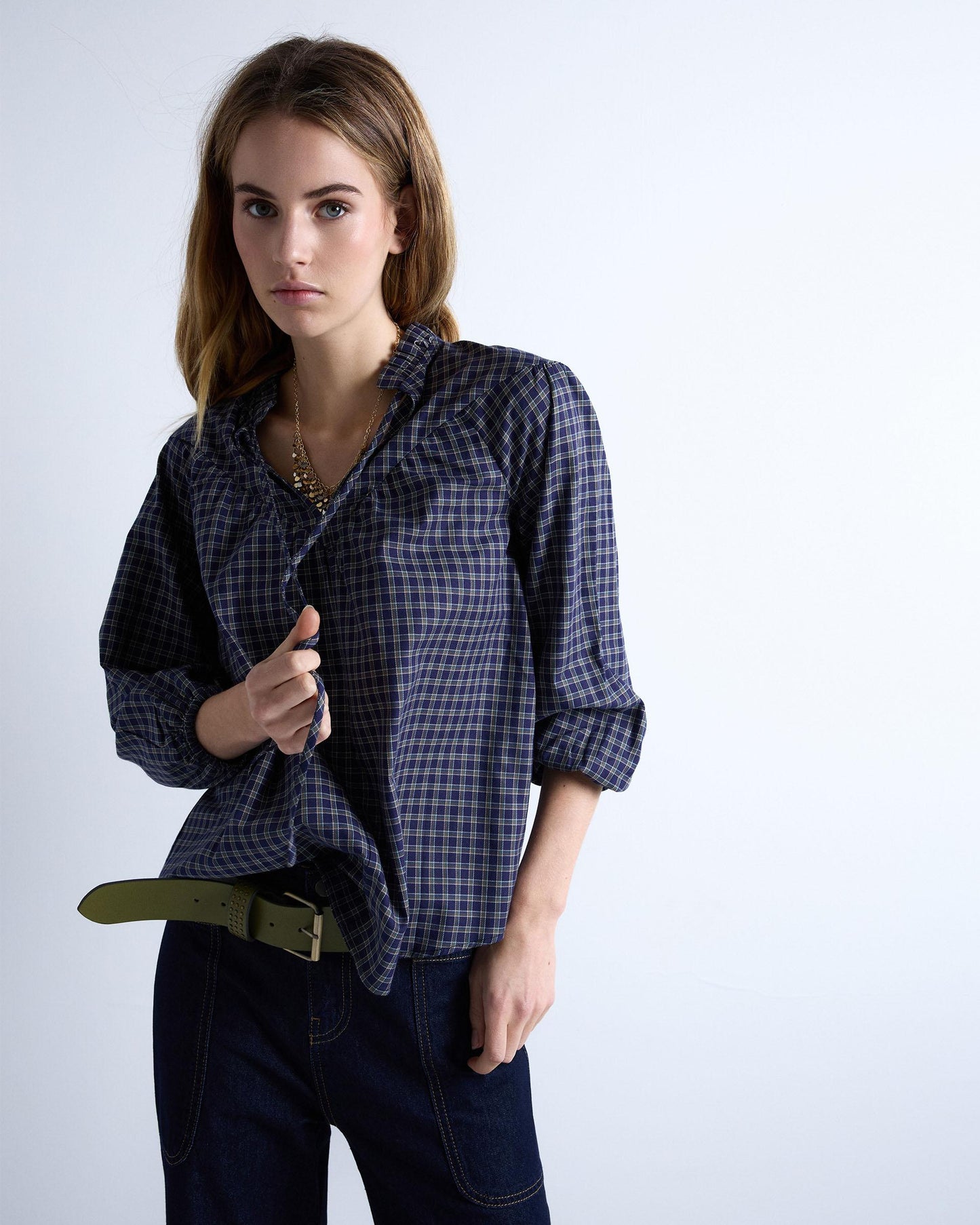 Blusa xadrez azul-escuro com pala