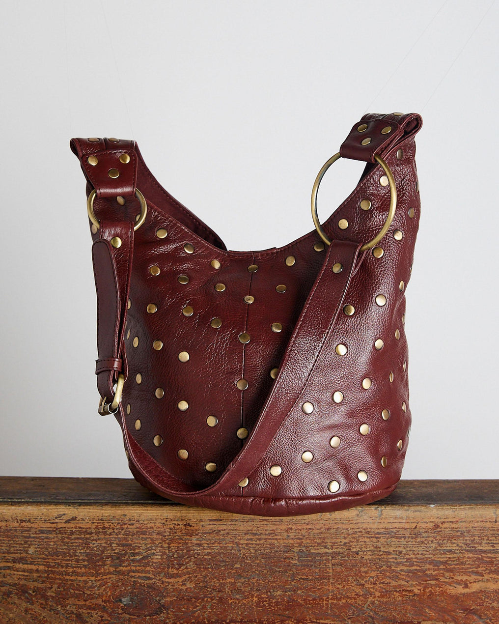 Burgundy Studded Bucket Leather Bag