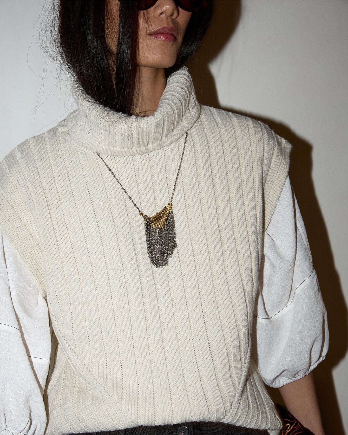 Raw Ribbed Turtleneck Knit Vest