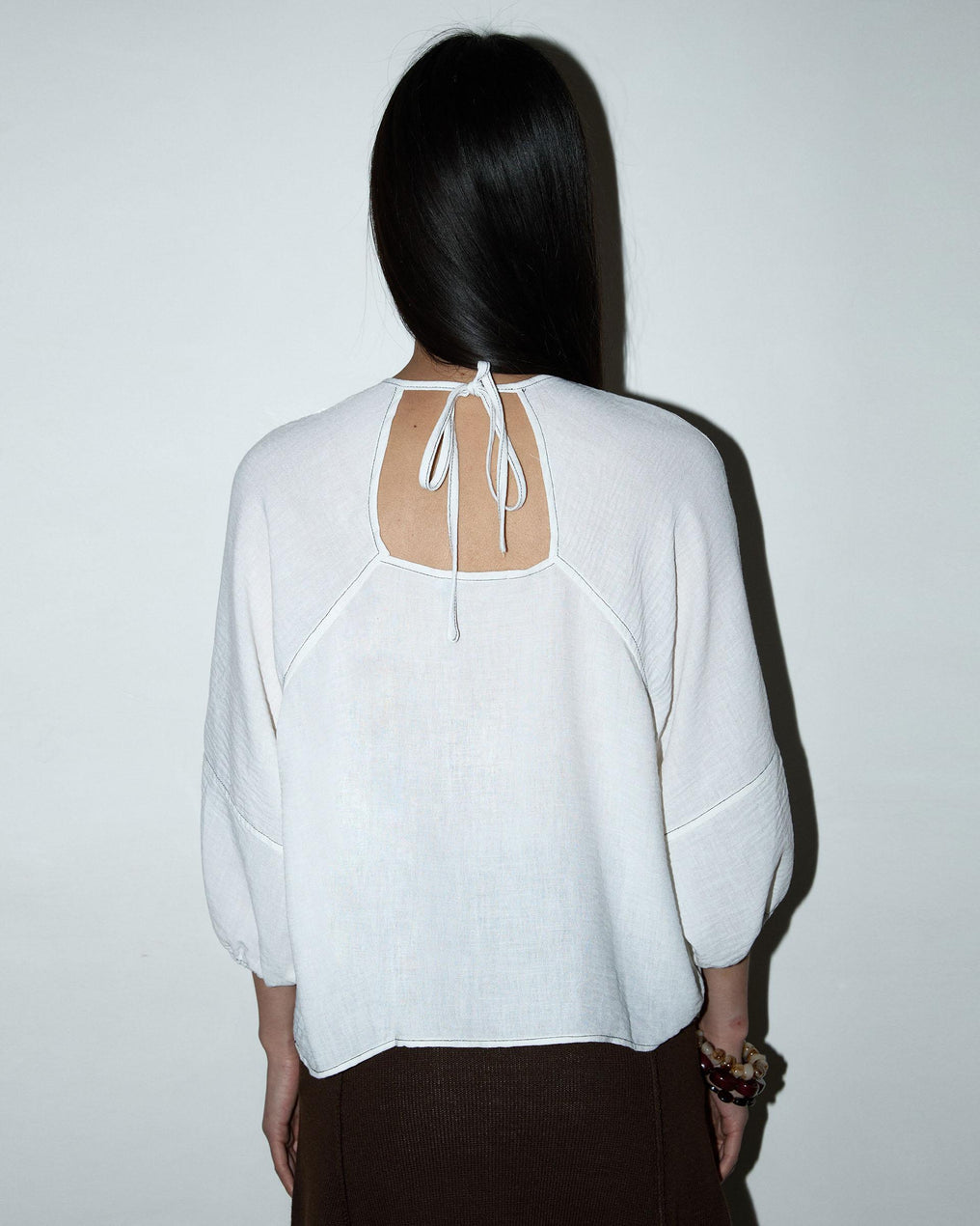 White Blouse with Low Back and Seams