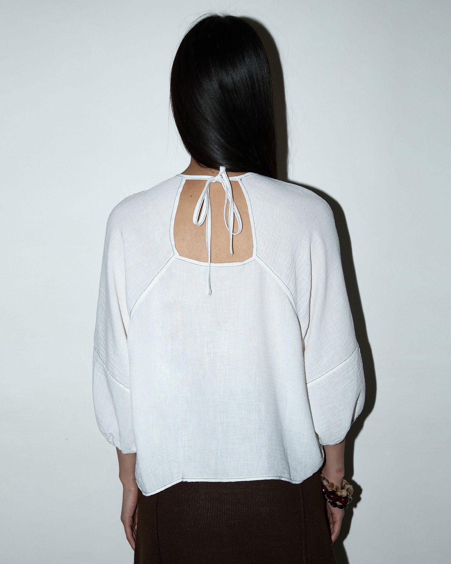 White Blouse with Low Back and Seams