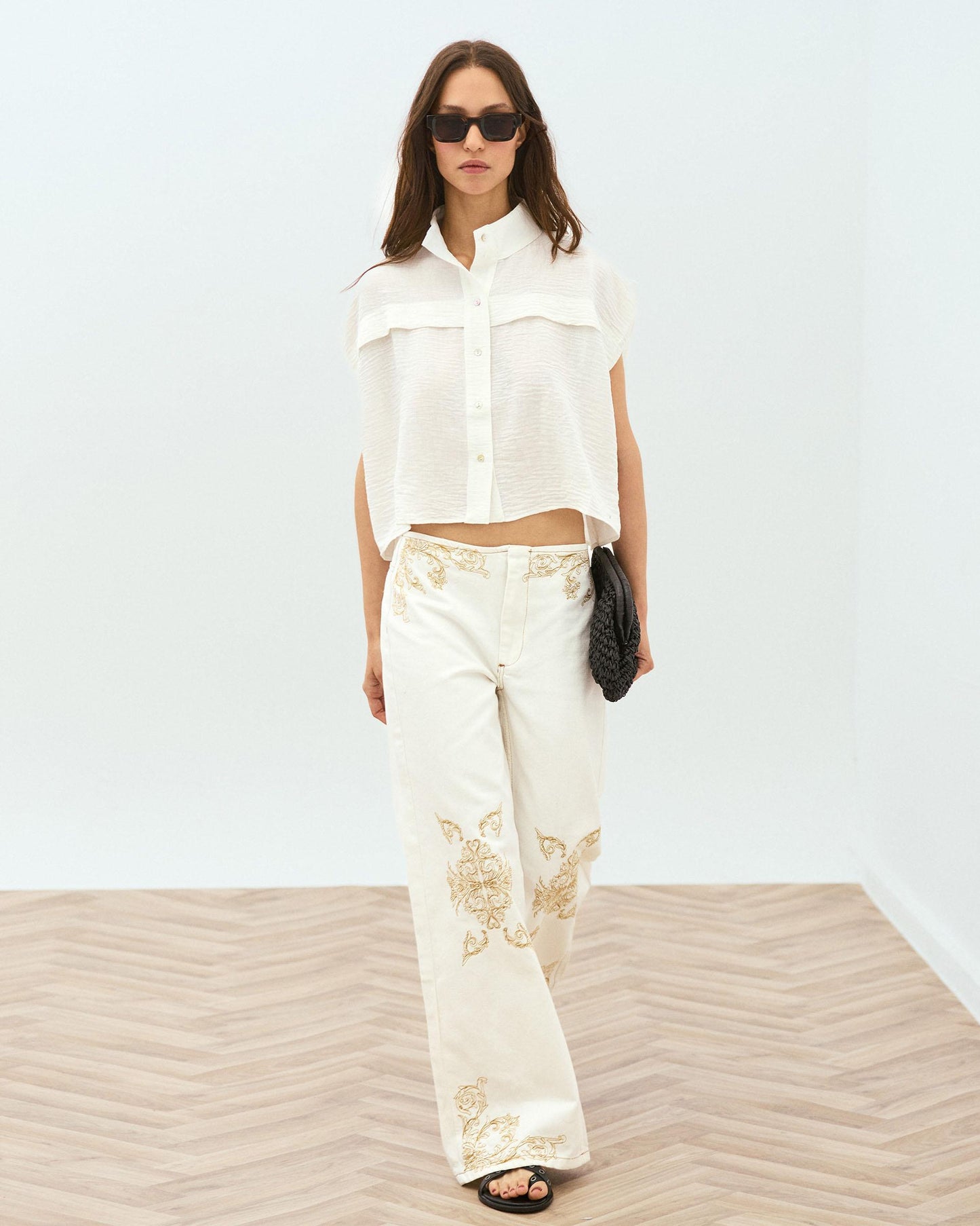 White Sleeveless Blouse with Shoulder Pads