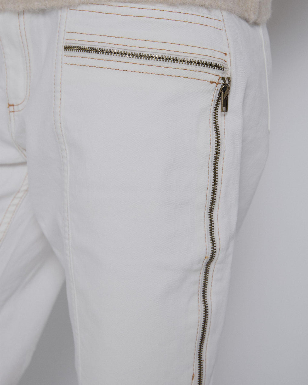 White Asymmetrical Zipper Jeans