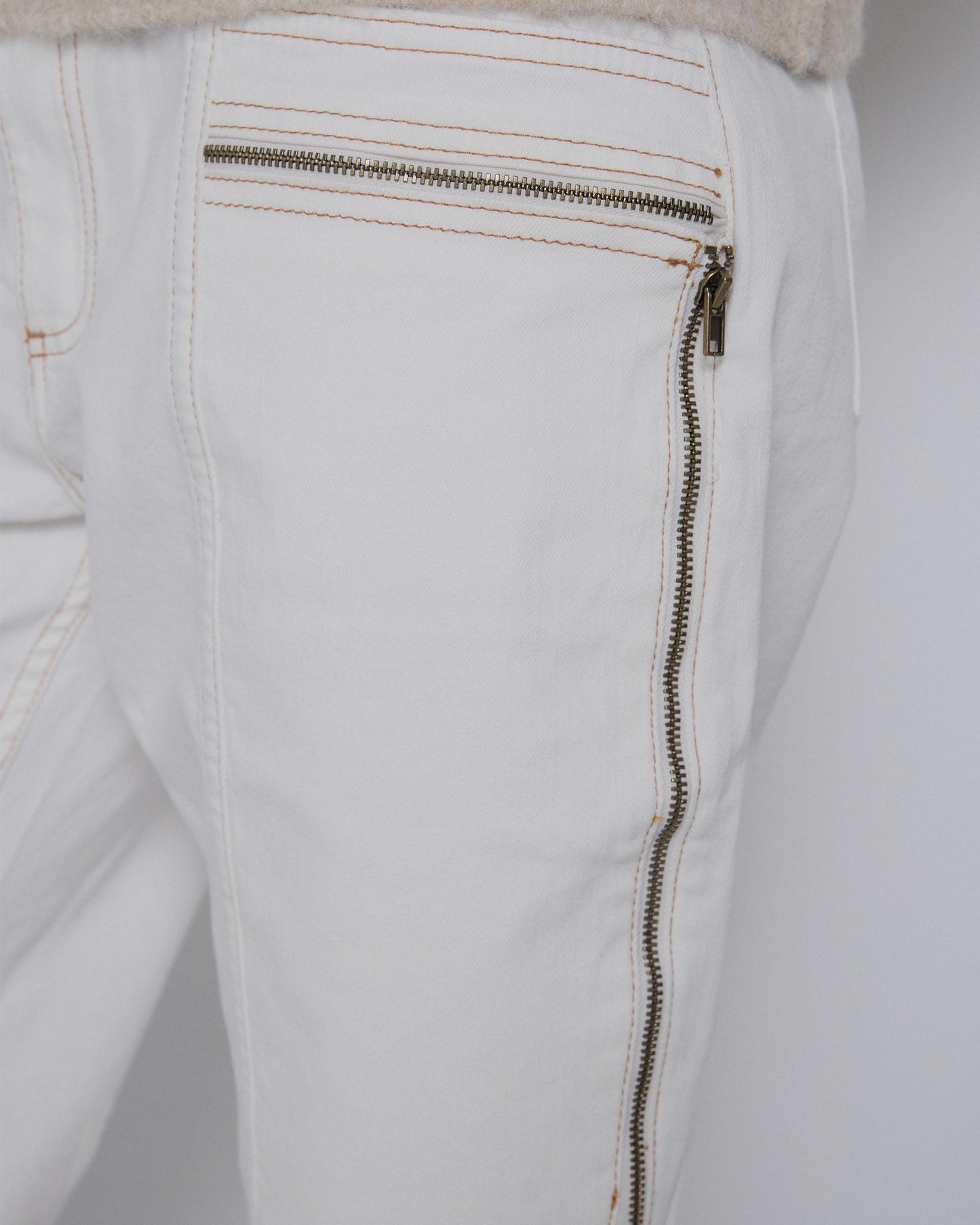 White Asymmetrical Zipper Jeans