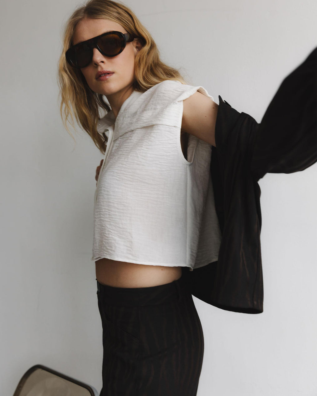 White Sleeveless Blouse with Shoulder Pads