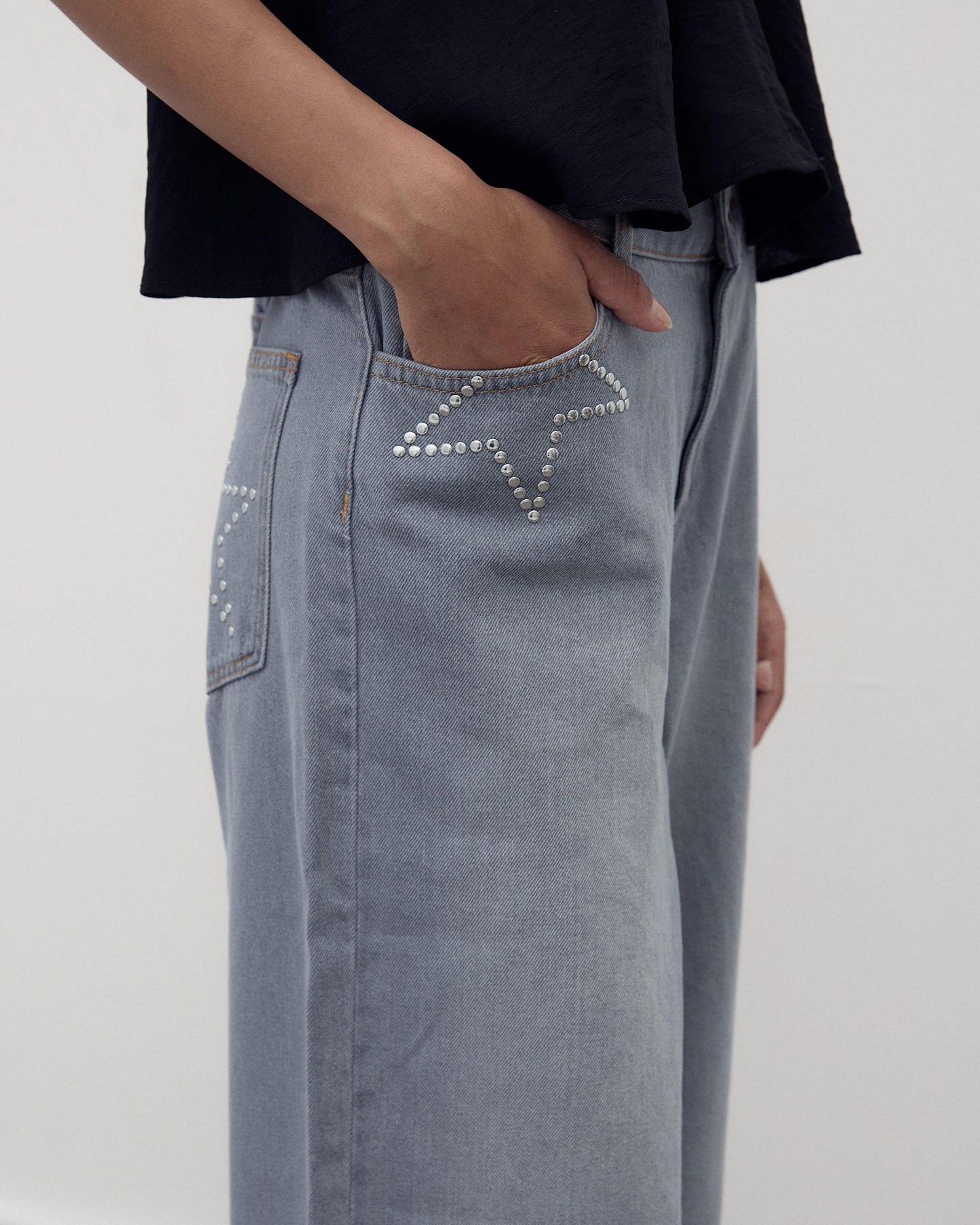 Jeans Tachas Estrelas Cinzento