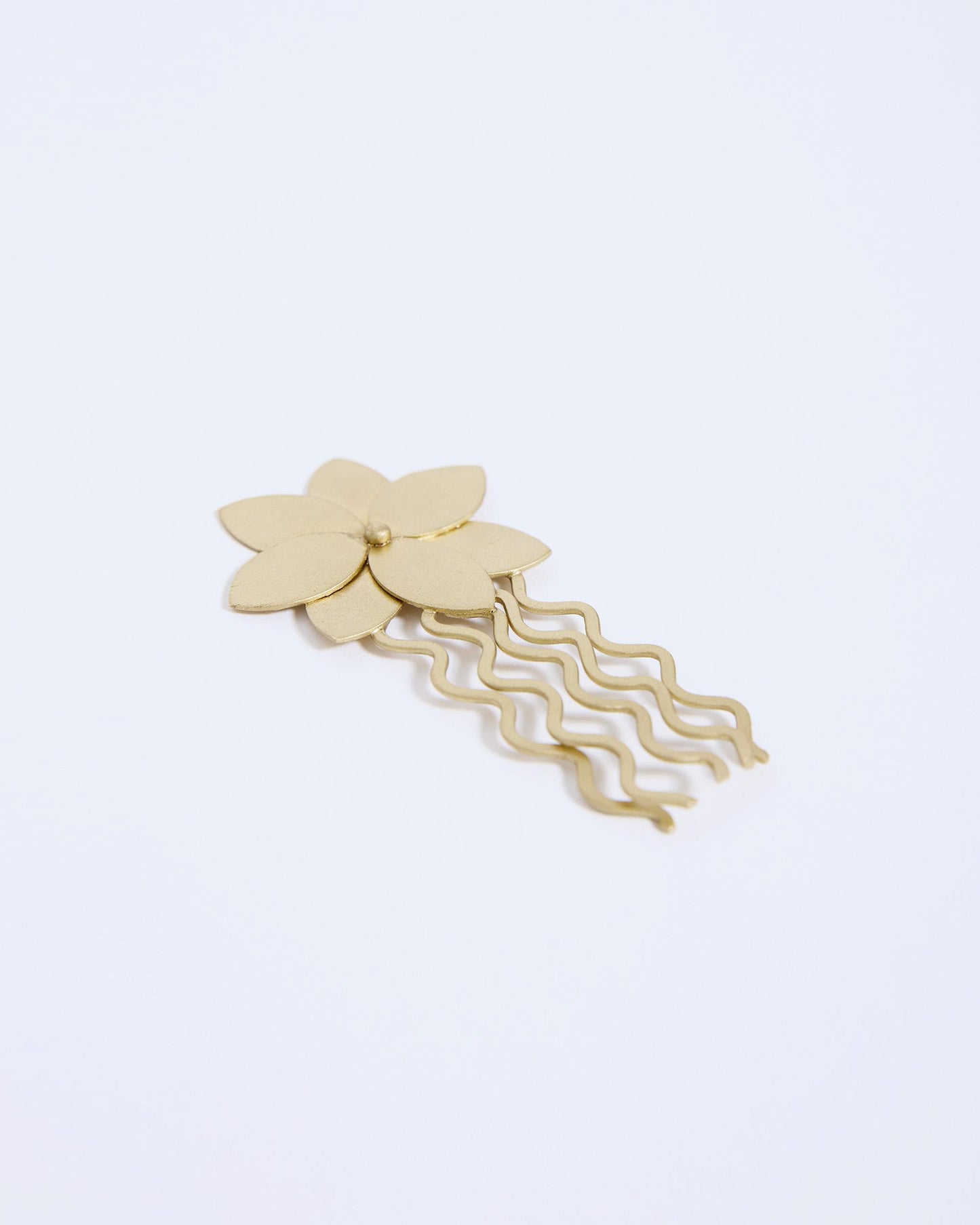 Pente de flor dourada