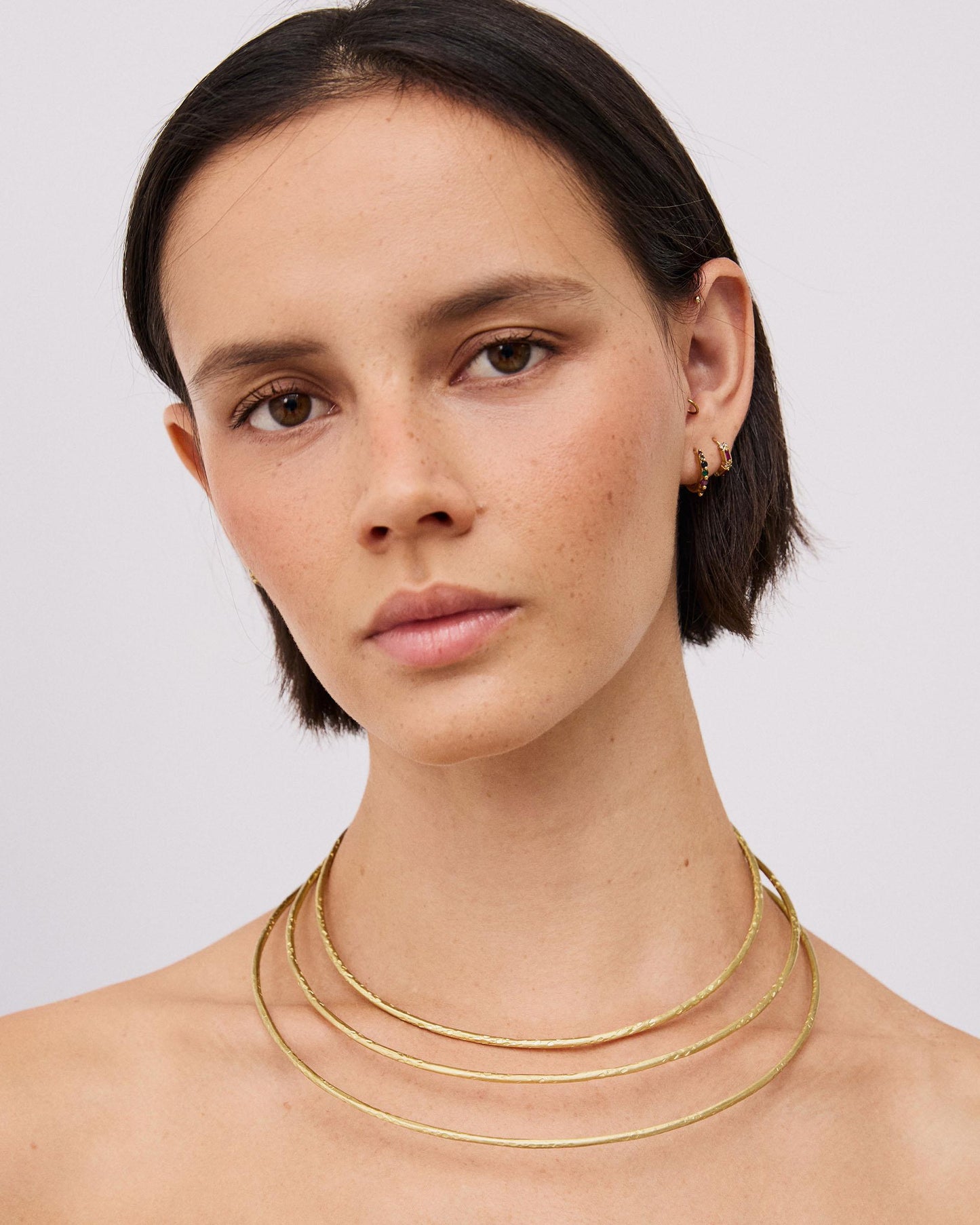 Collar Triple Aro Rígido Oro