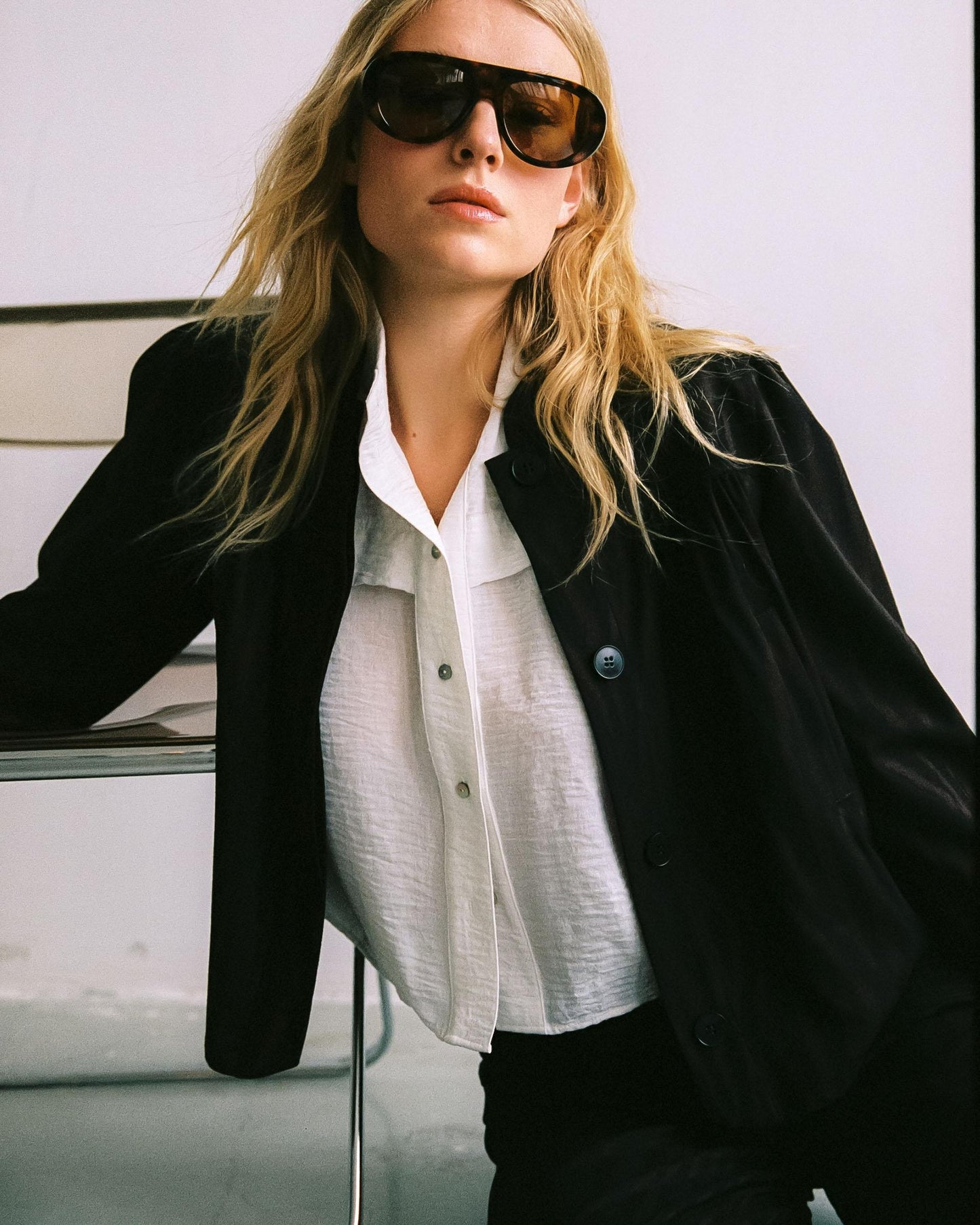 White Sleeveless Blouse with Shoulder Pads