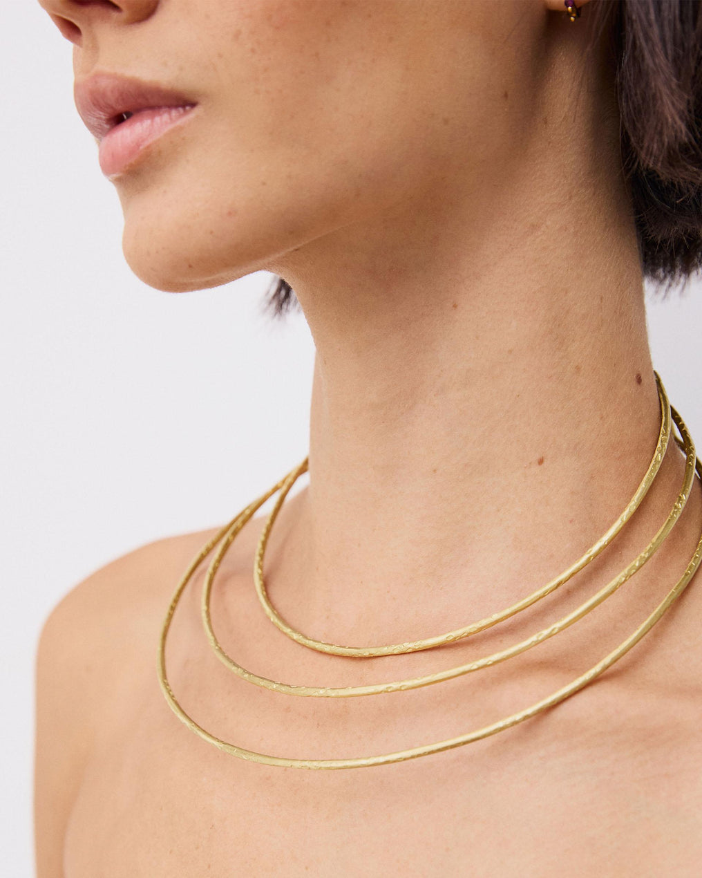 Collar Triple Aro Rígido Oro
