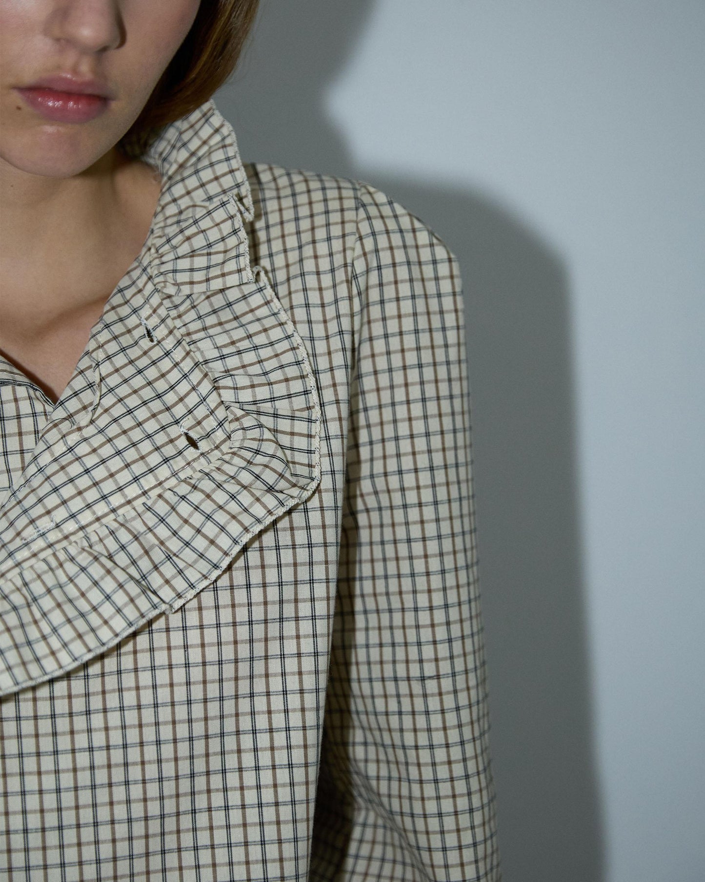 Blusa xadrez off-white com folho lateral