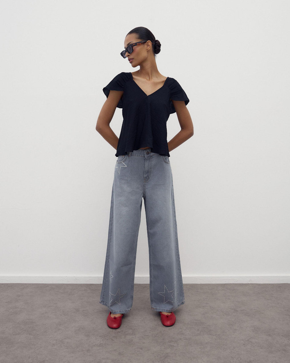 Jeans Tachas Estrelas Cinzento