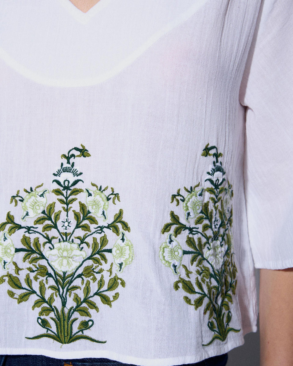 White Blouse with Floral Embroidery and V-Neck Yoke