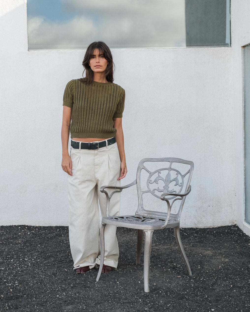 Blusa de malha verde vazada com manga curta