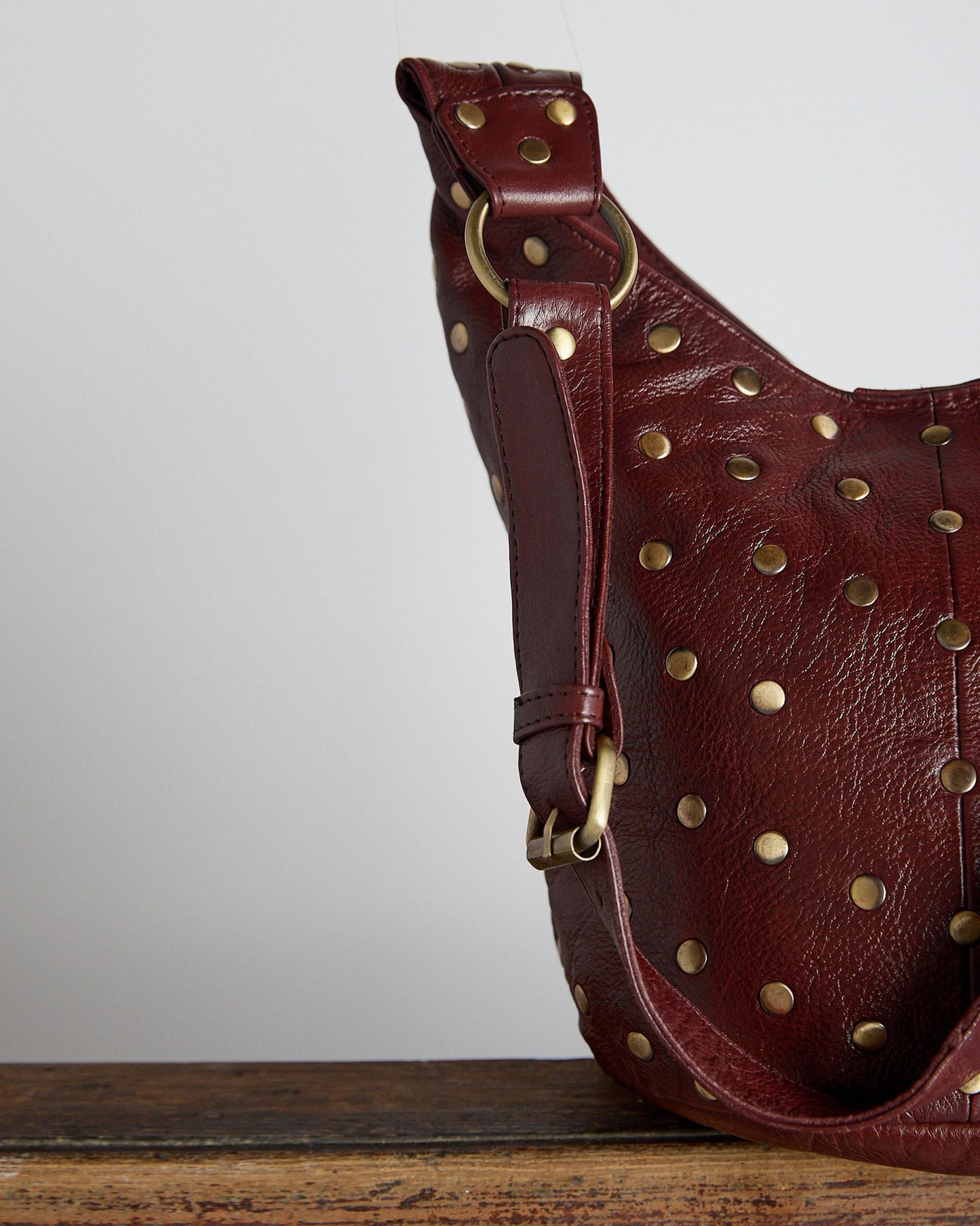 Burgundy Studded Bucket Leather Bag