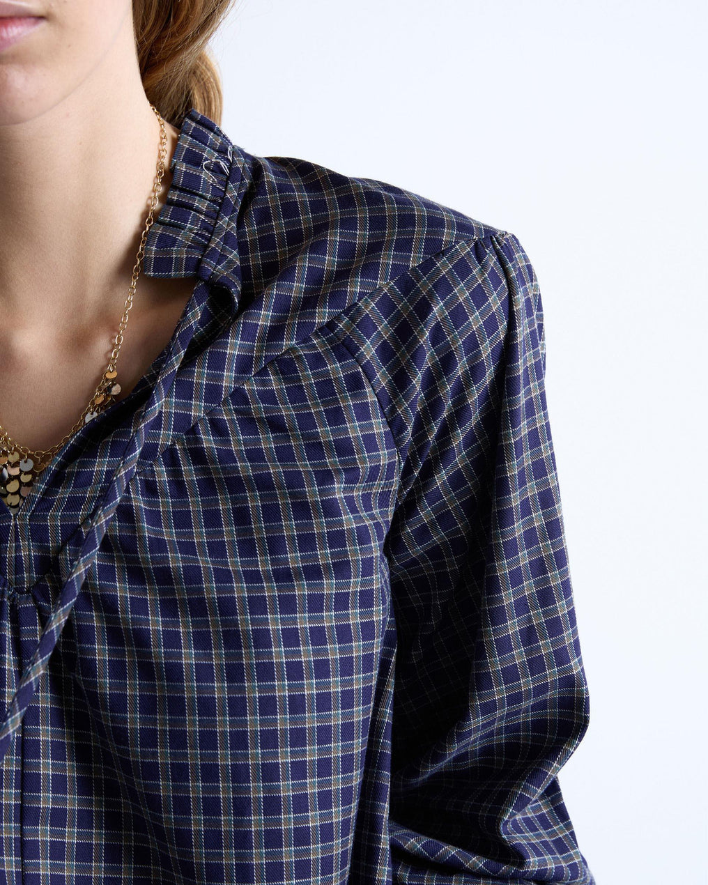 Blusa xadrez azul-escuro com pala