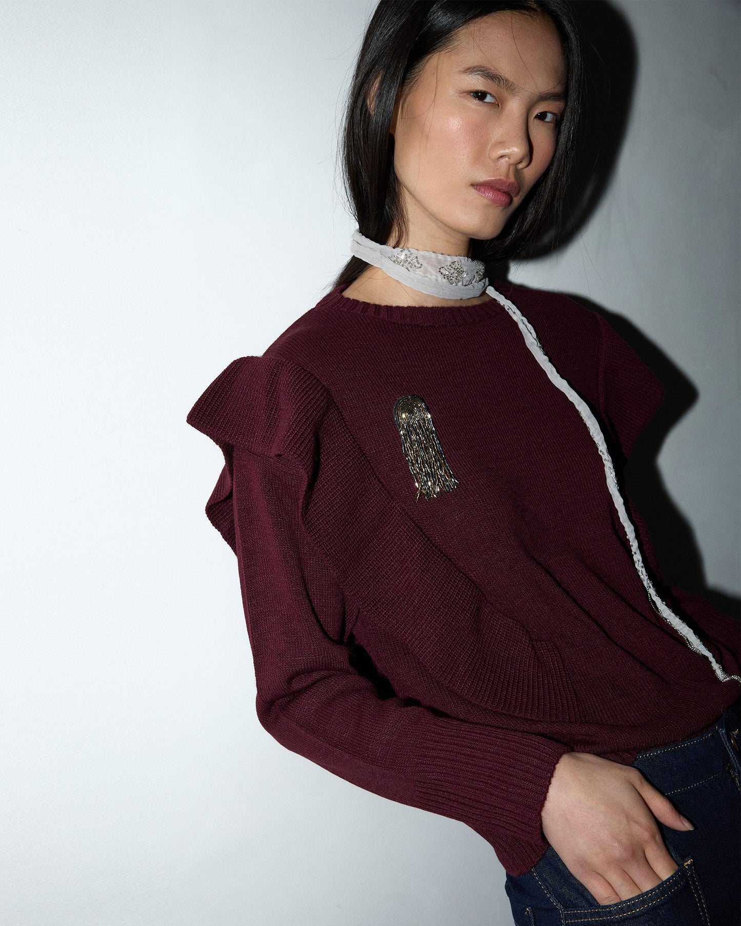 Camisola roxa com folhos laterais