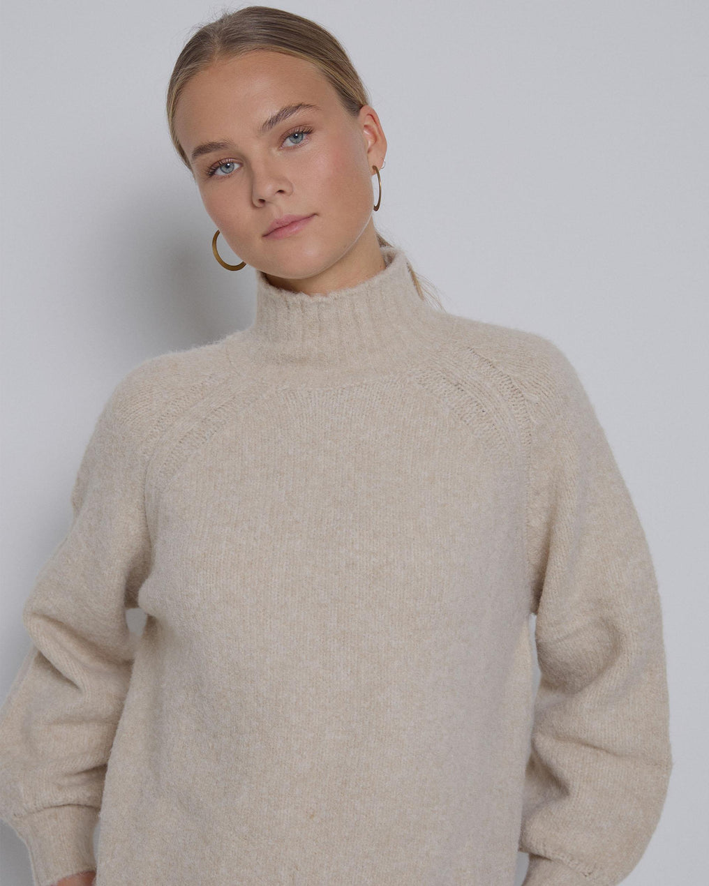 Camisola de malha crua com gola alta