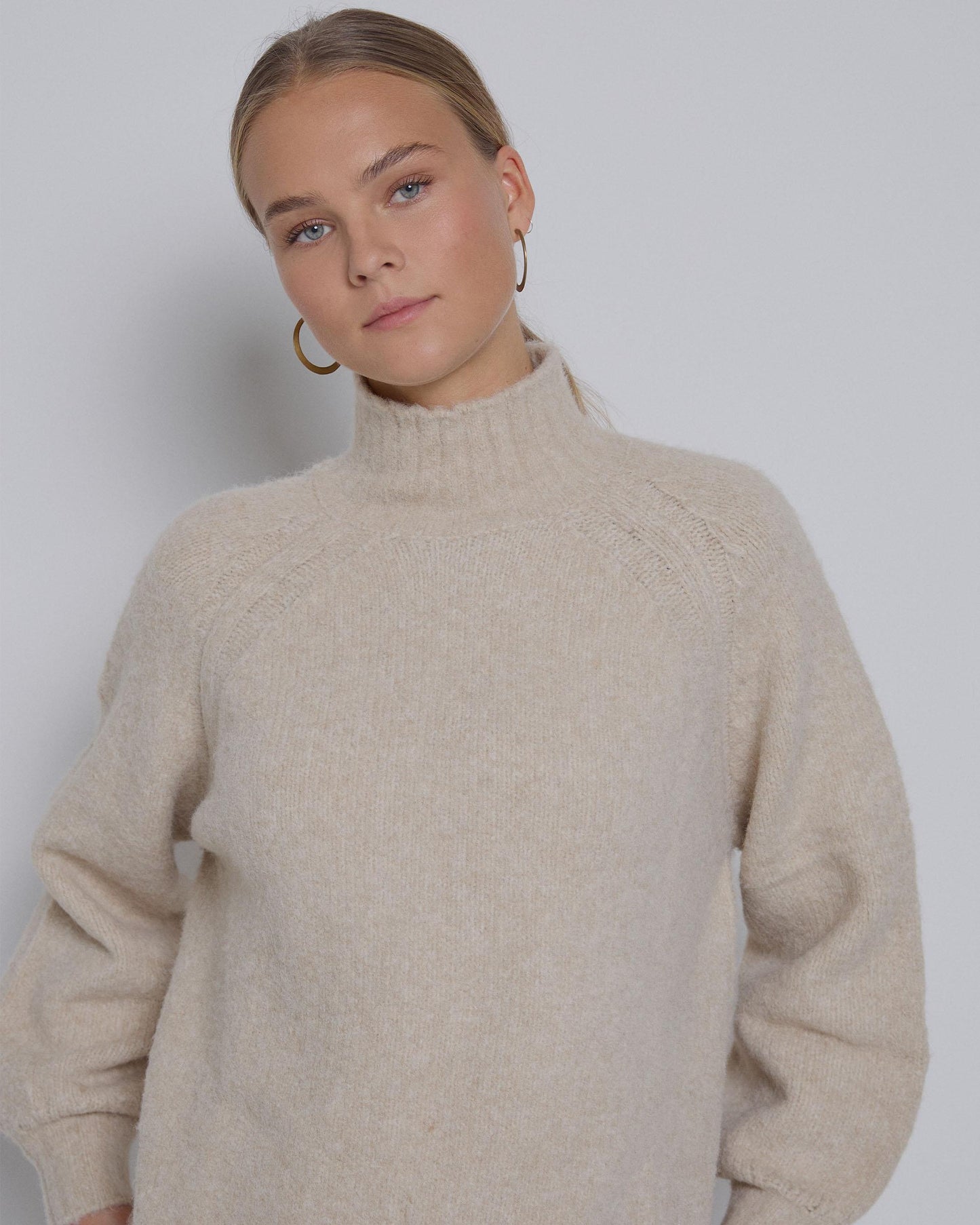 Camisola de malha crua com gola alta