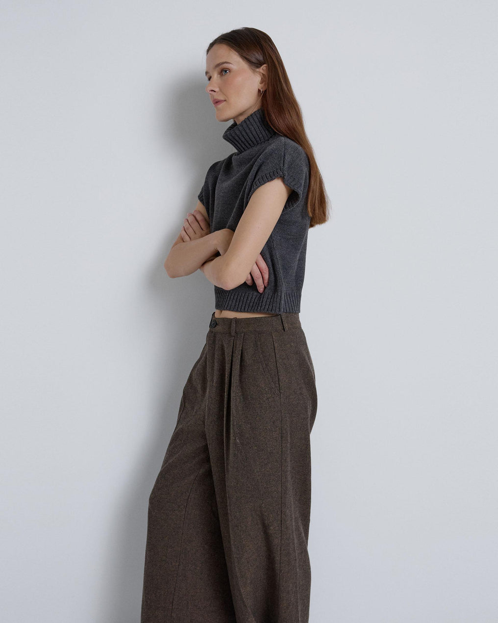 Double-pleated trousers in brown herringbone fabric