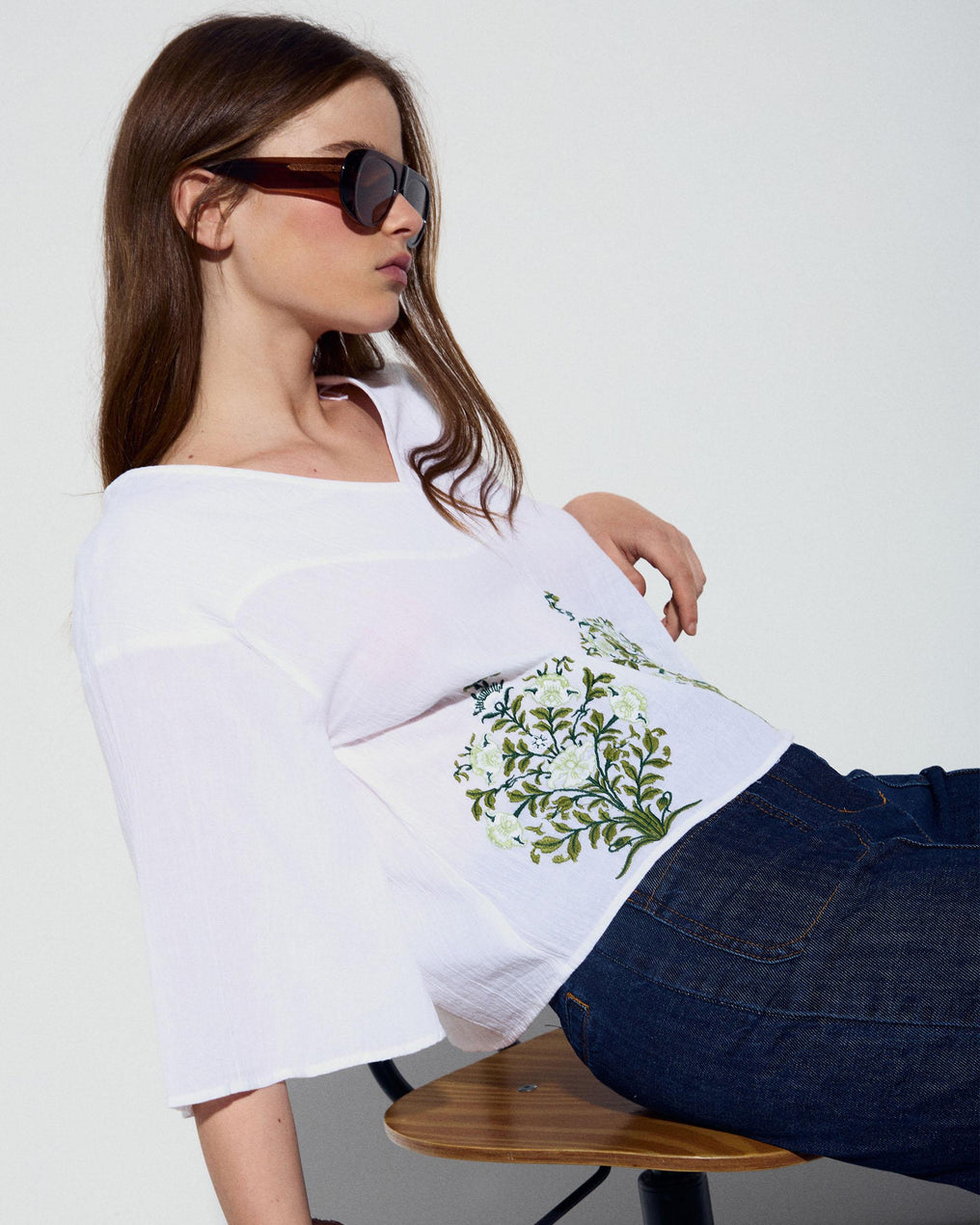 White Blouse with Floral Embroidery and V-Neck Yoke