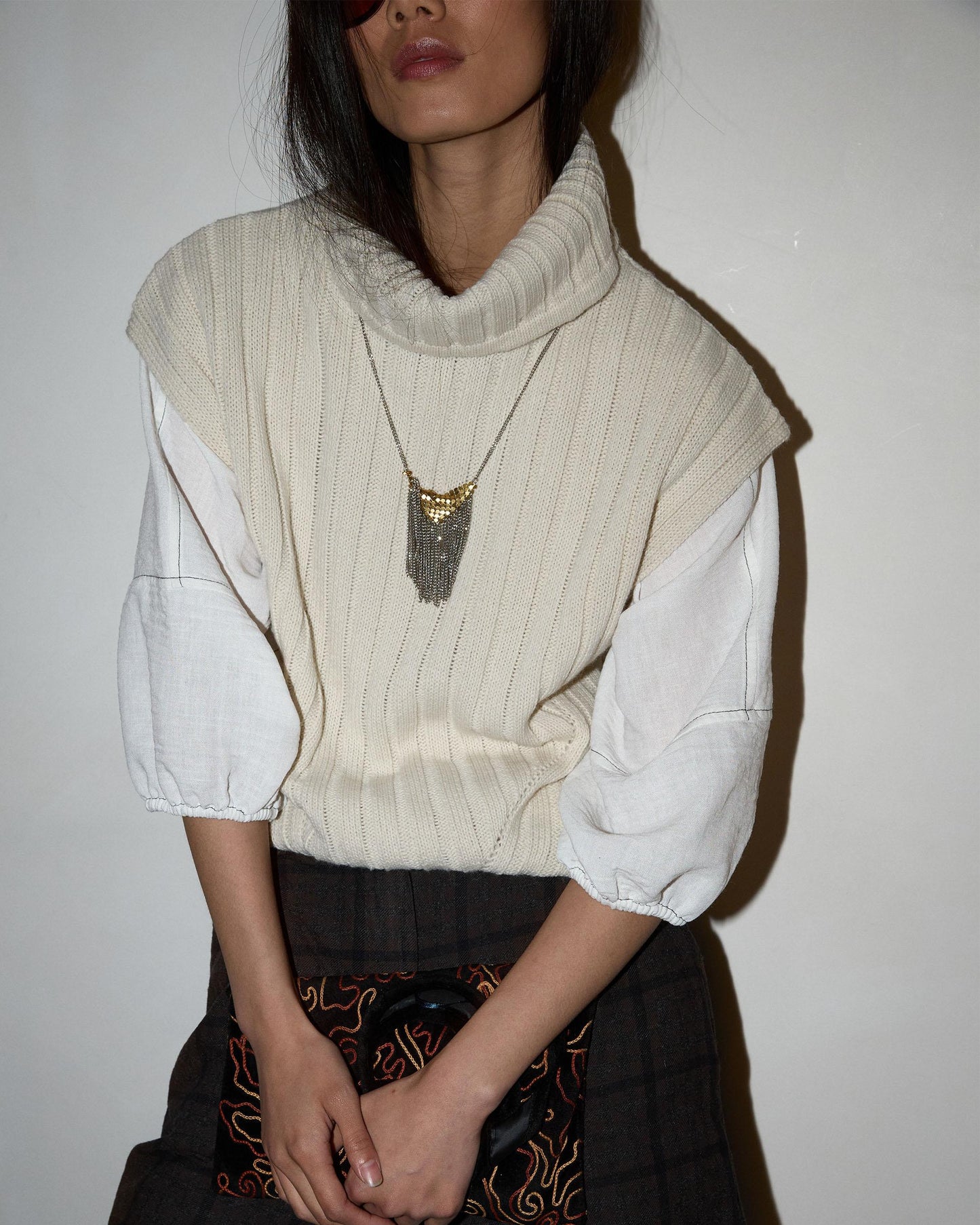 Raw Ribbed Turtleneck Knit Vest