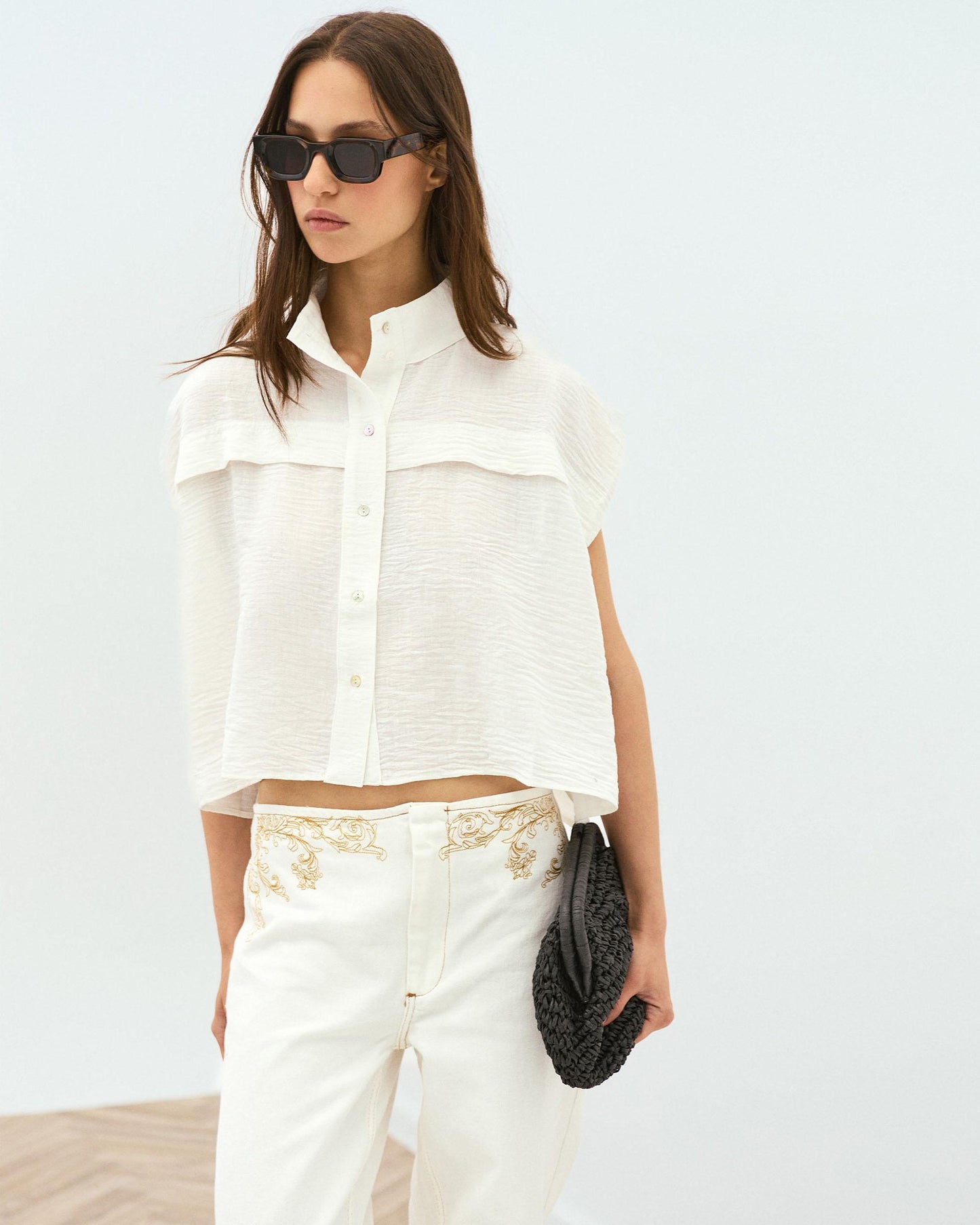 White Sleeveless Blouse with Shoulder Pads