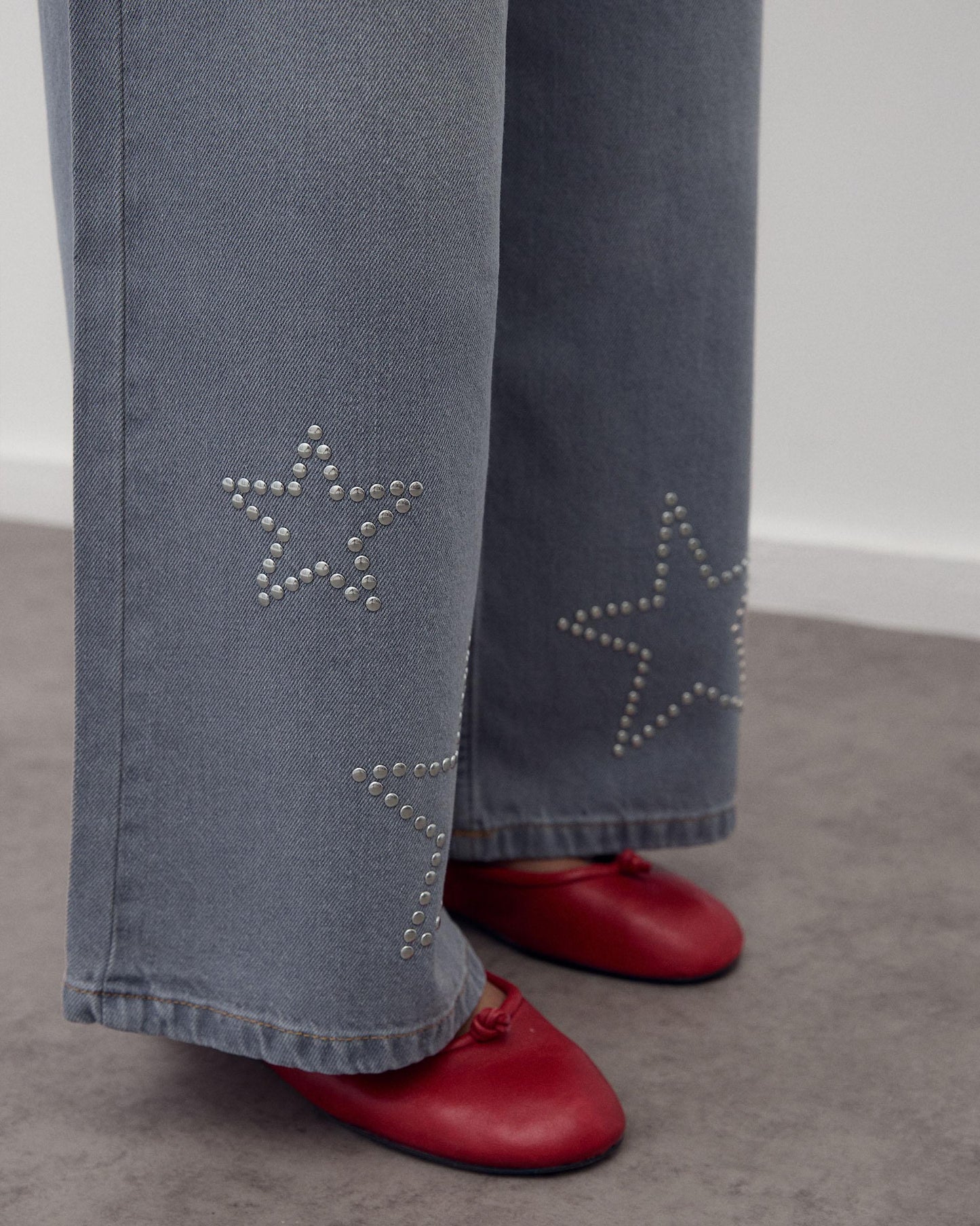 Jeans Tachas Estrelas Cinzento