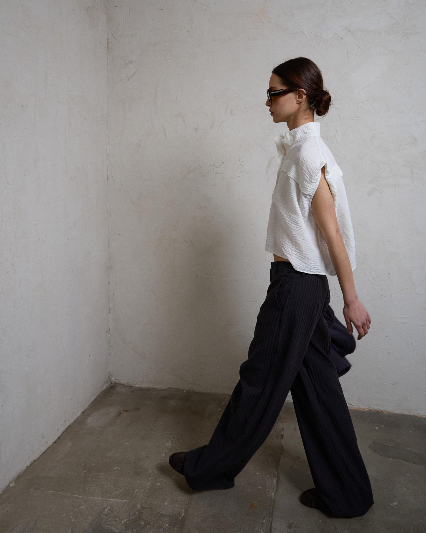 White Sleeveless Blouse with Shoulder Pads