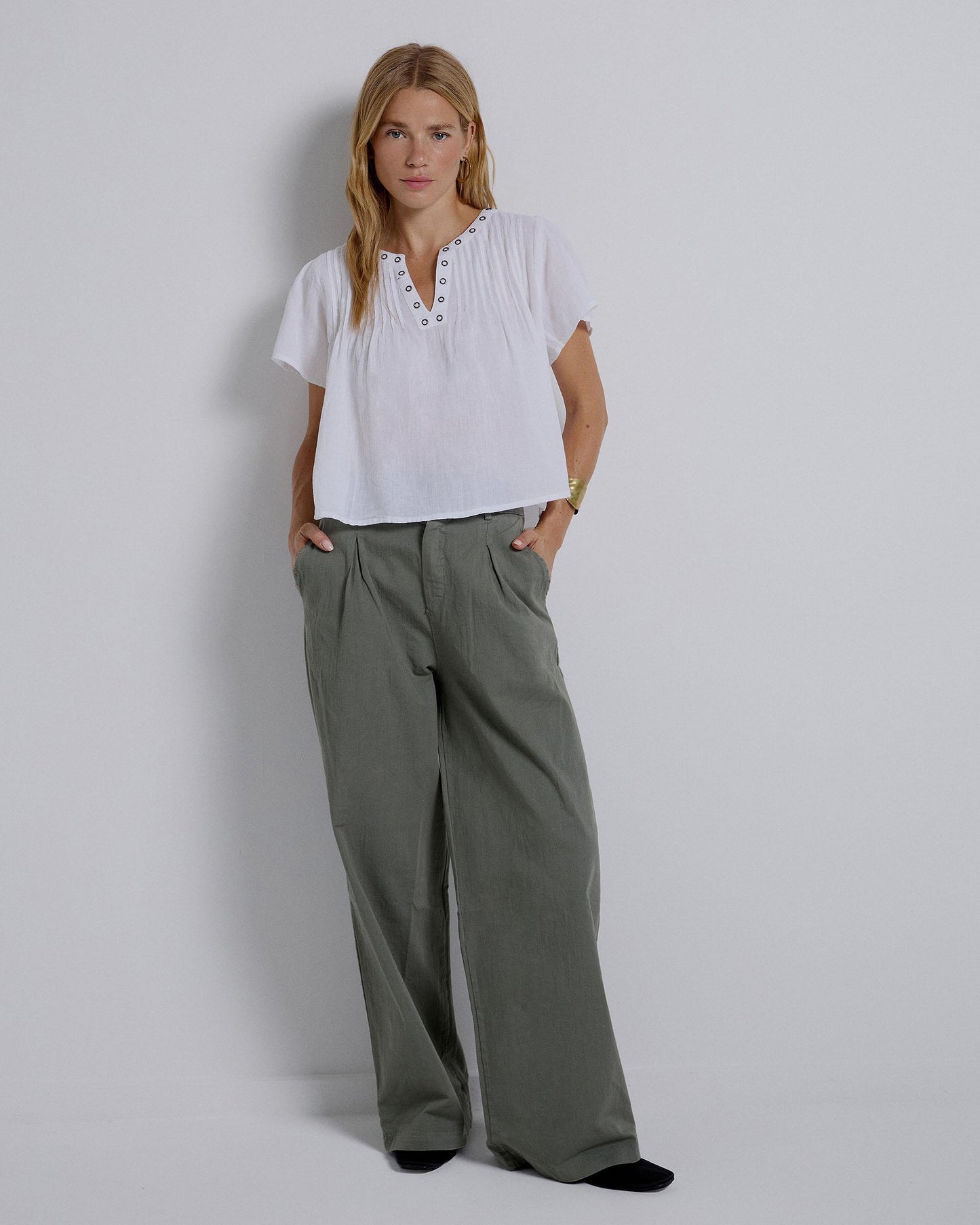 Long Trousers with Dark Green Pleats