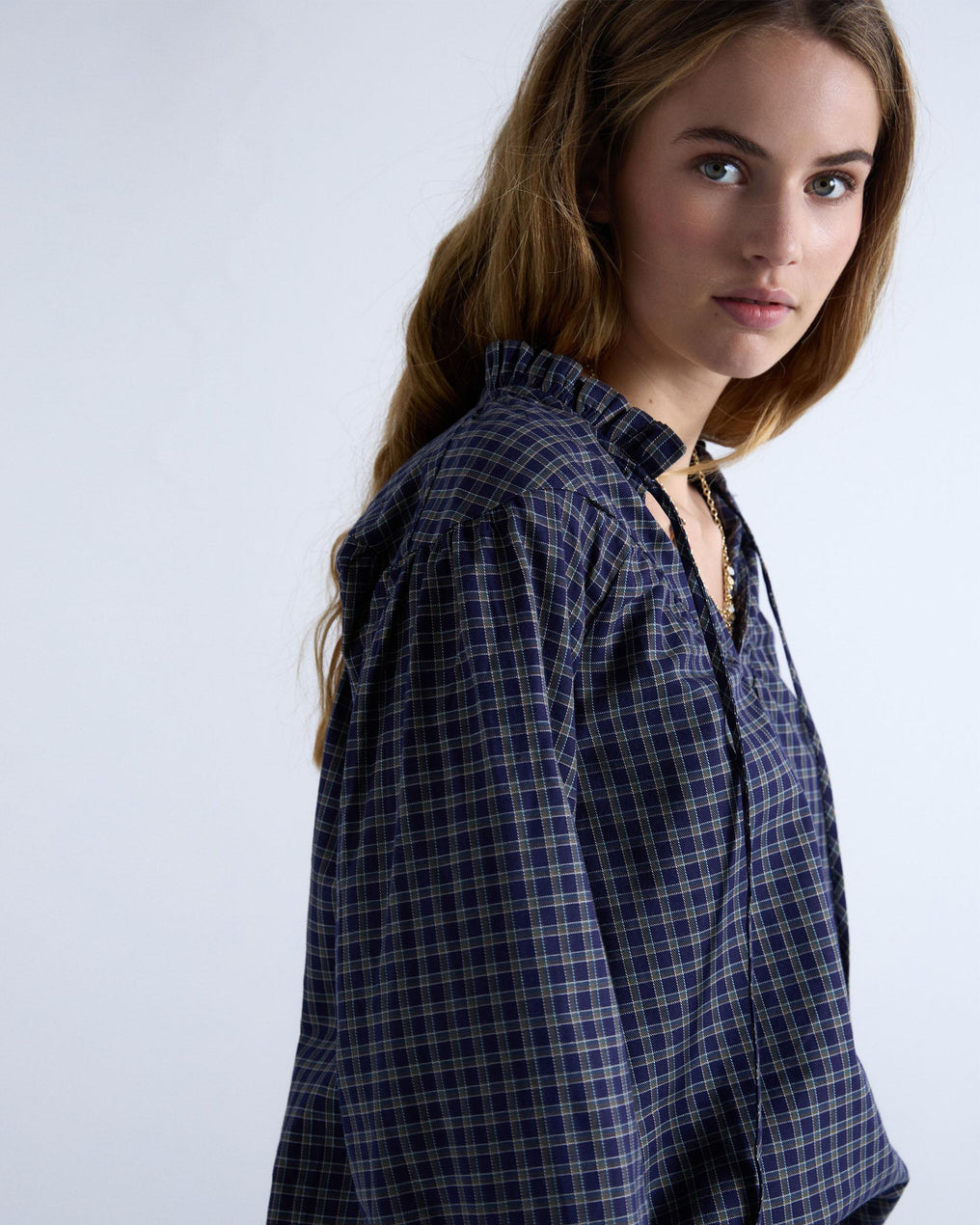 Blusa xadrez azul-escuro com pala