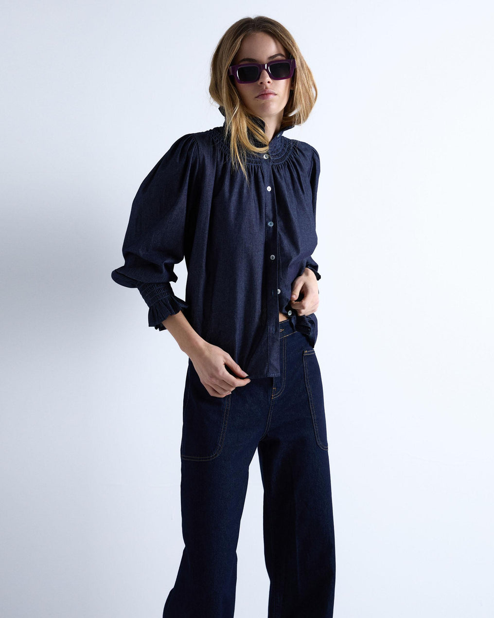 Blusa de ganga de gola alta em ganga azul