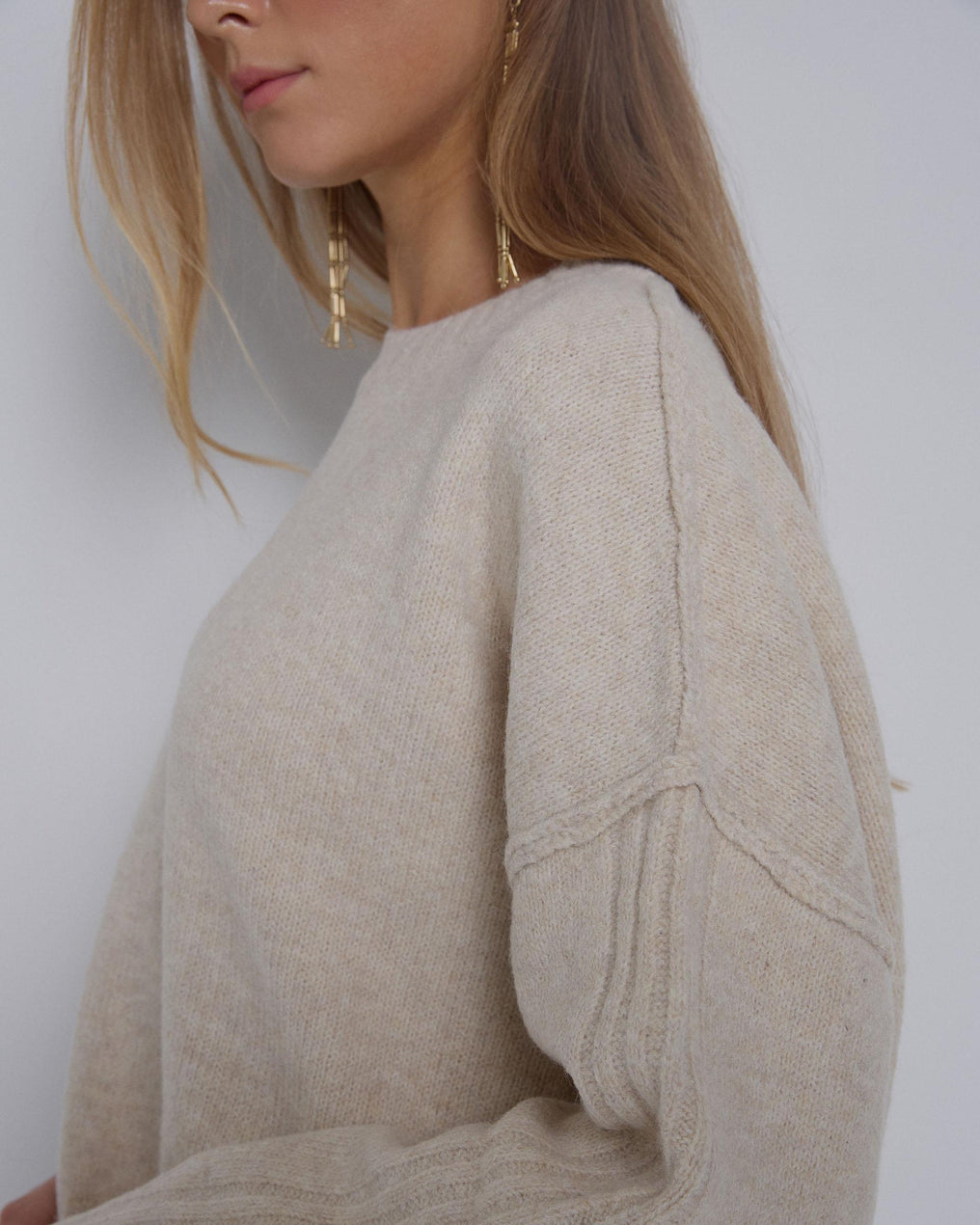 Camisola com costuras nas mangas bege
