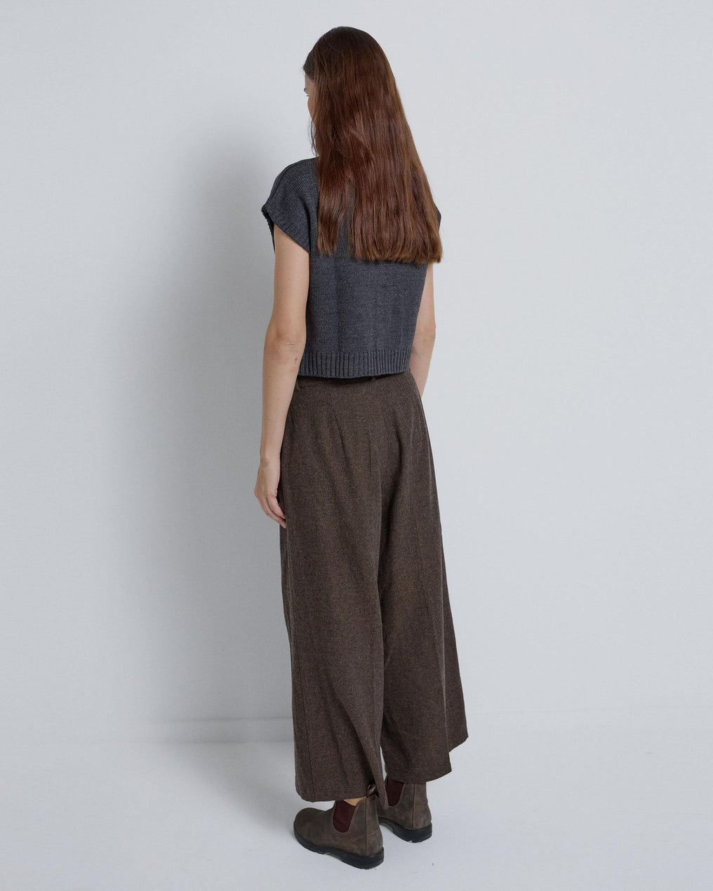 Double-pleated trousers in brown herringbone fabric