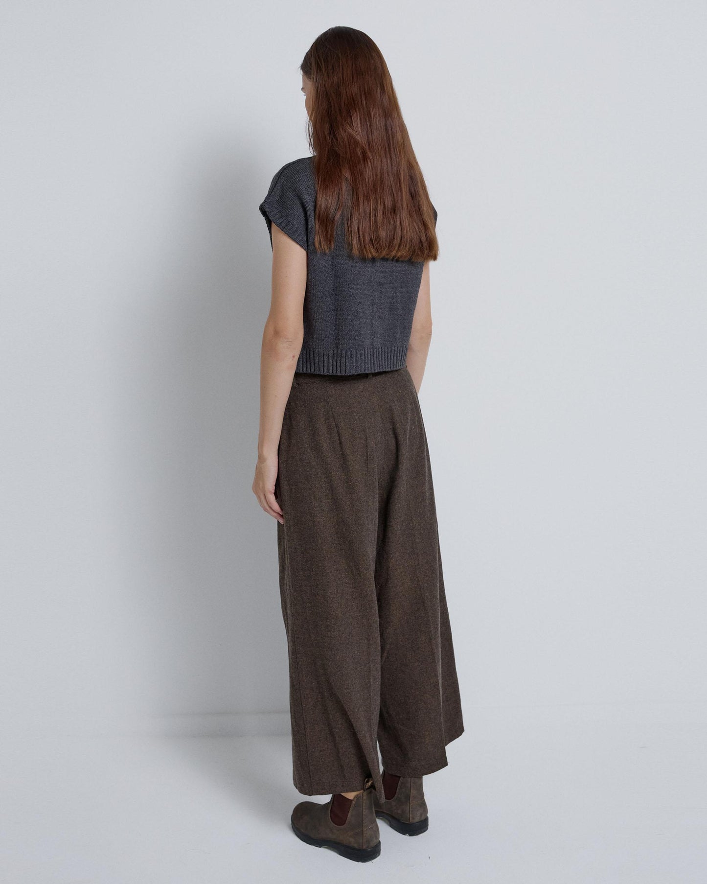 Double-pleated trousers in brown herringbone fabric