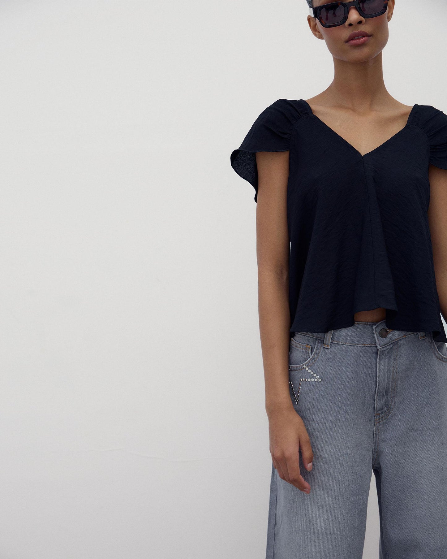 Jeans Tachas Estrelas Cinzento