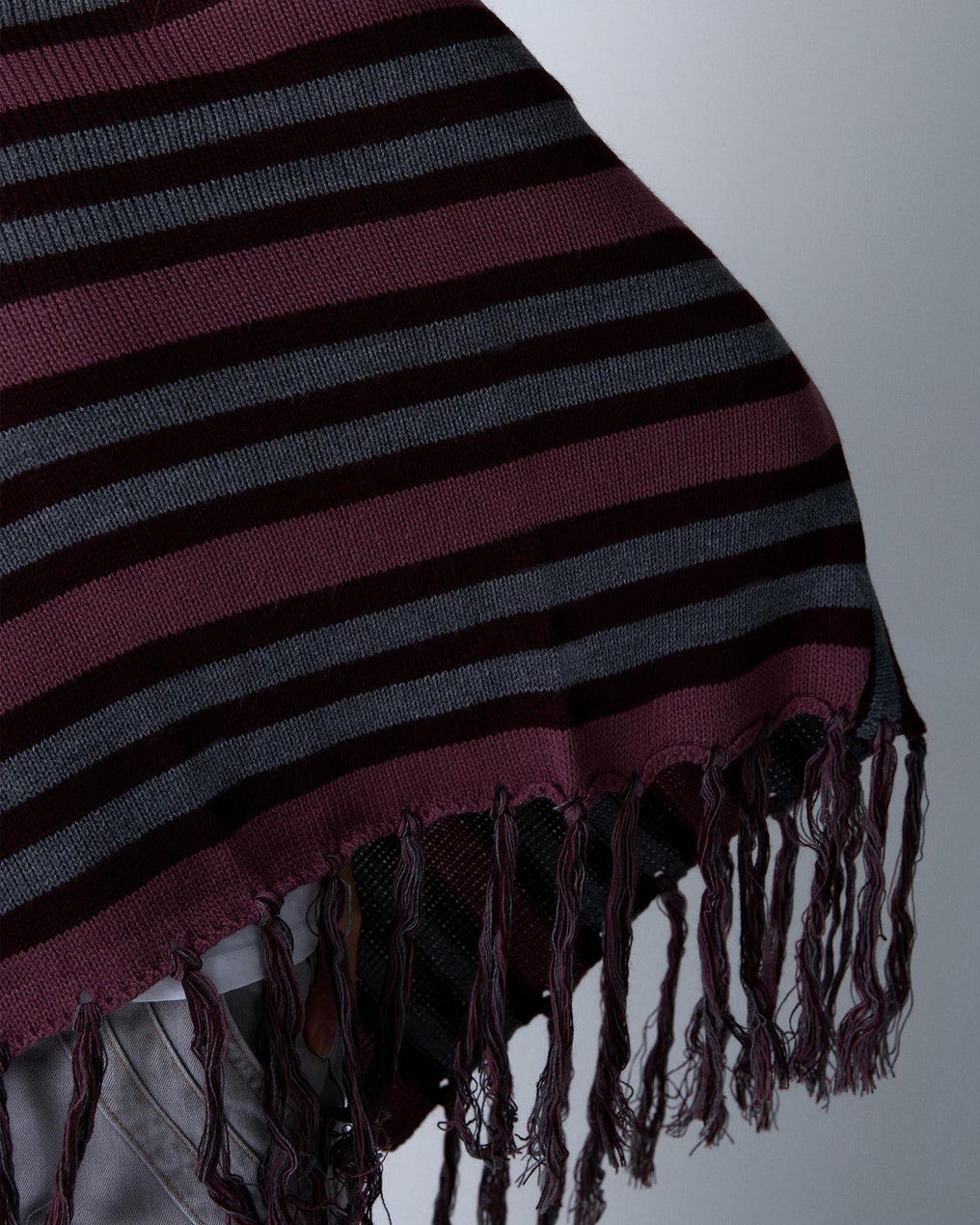 Poncho Rayas Flecos Morado