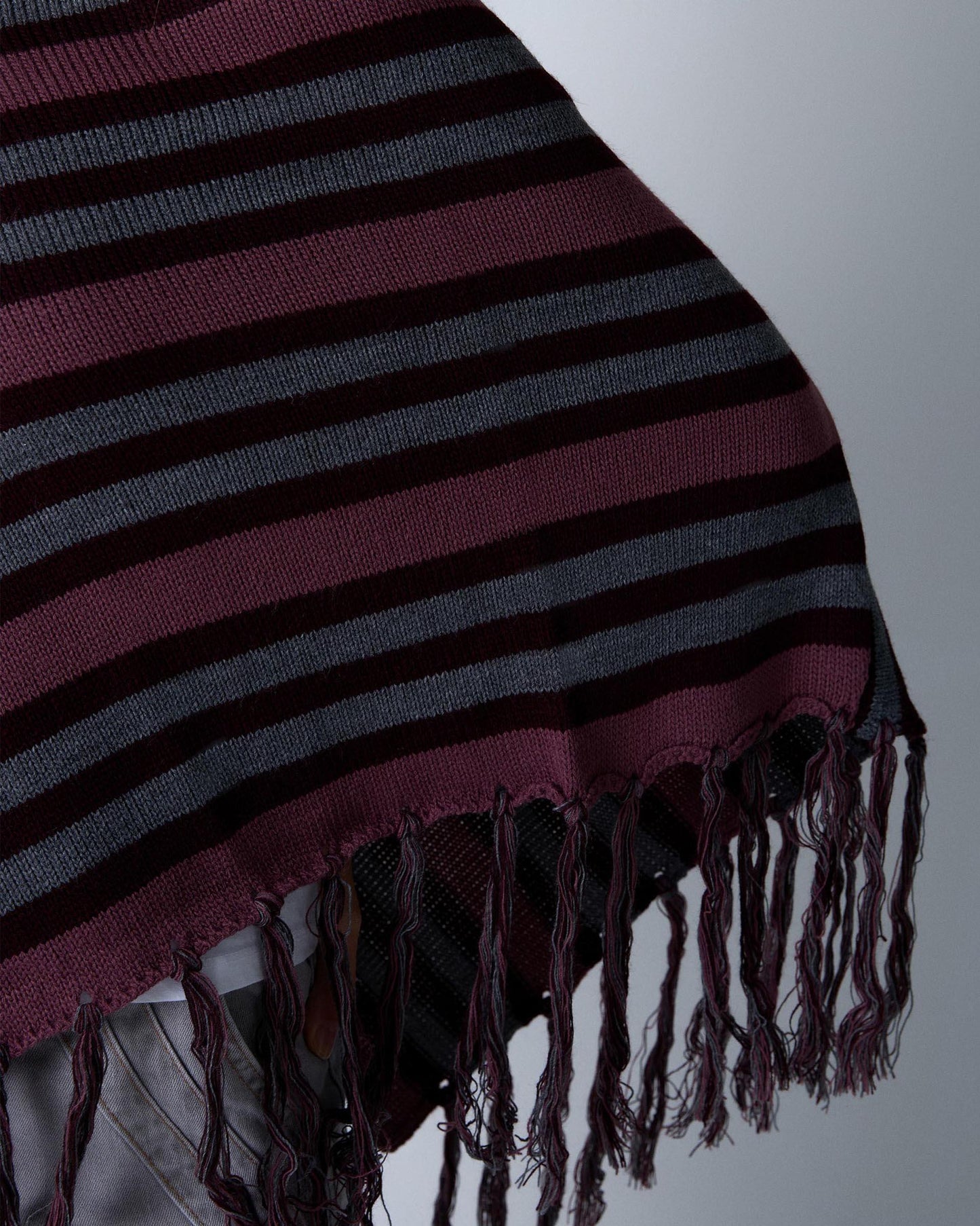 Poncho Rayas Flecos Morado