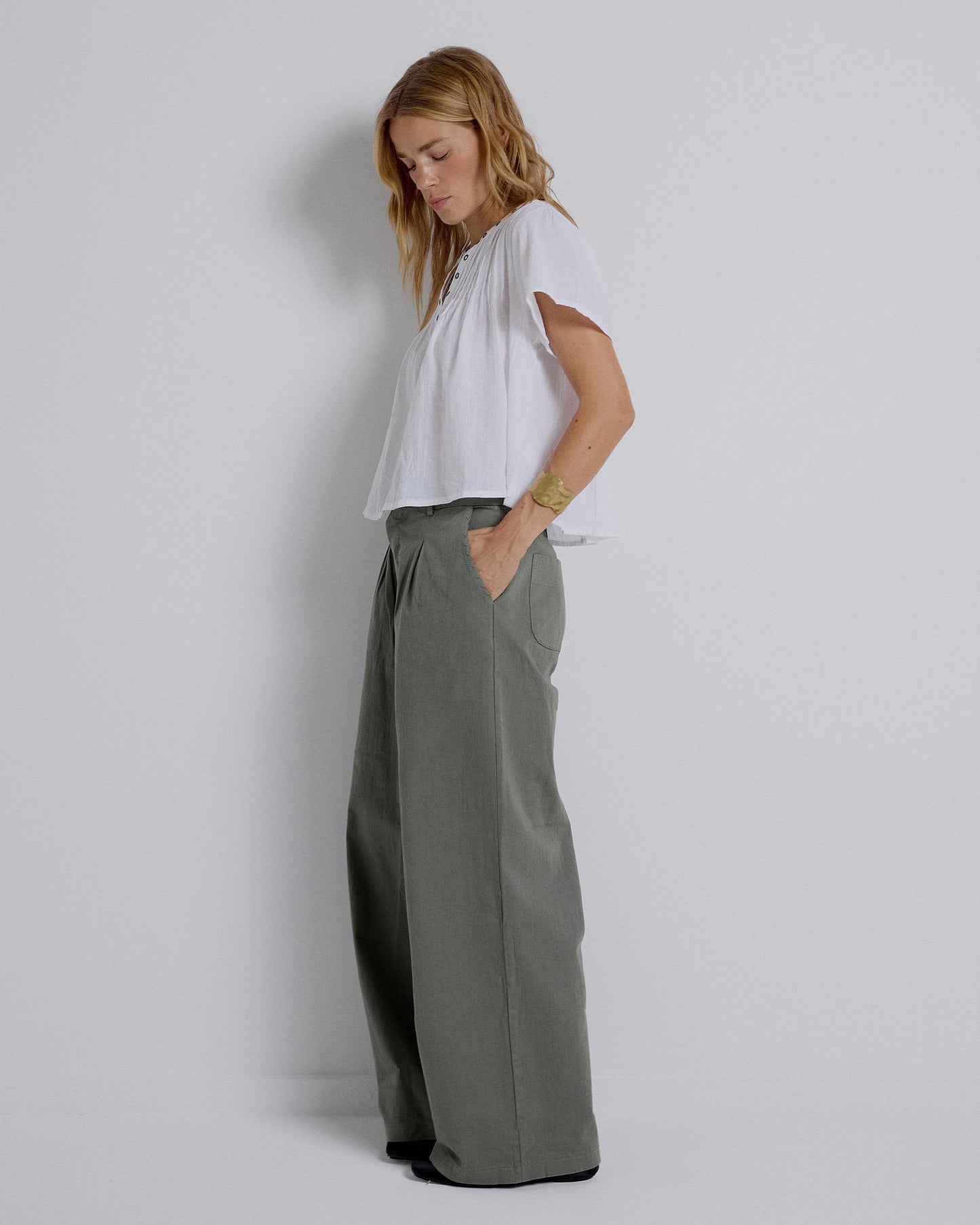 Long Trousers with Dark Green Pleats