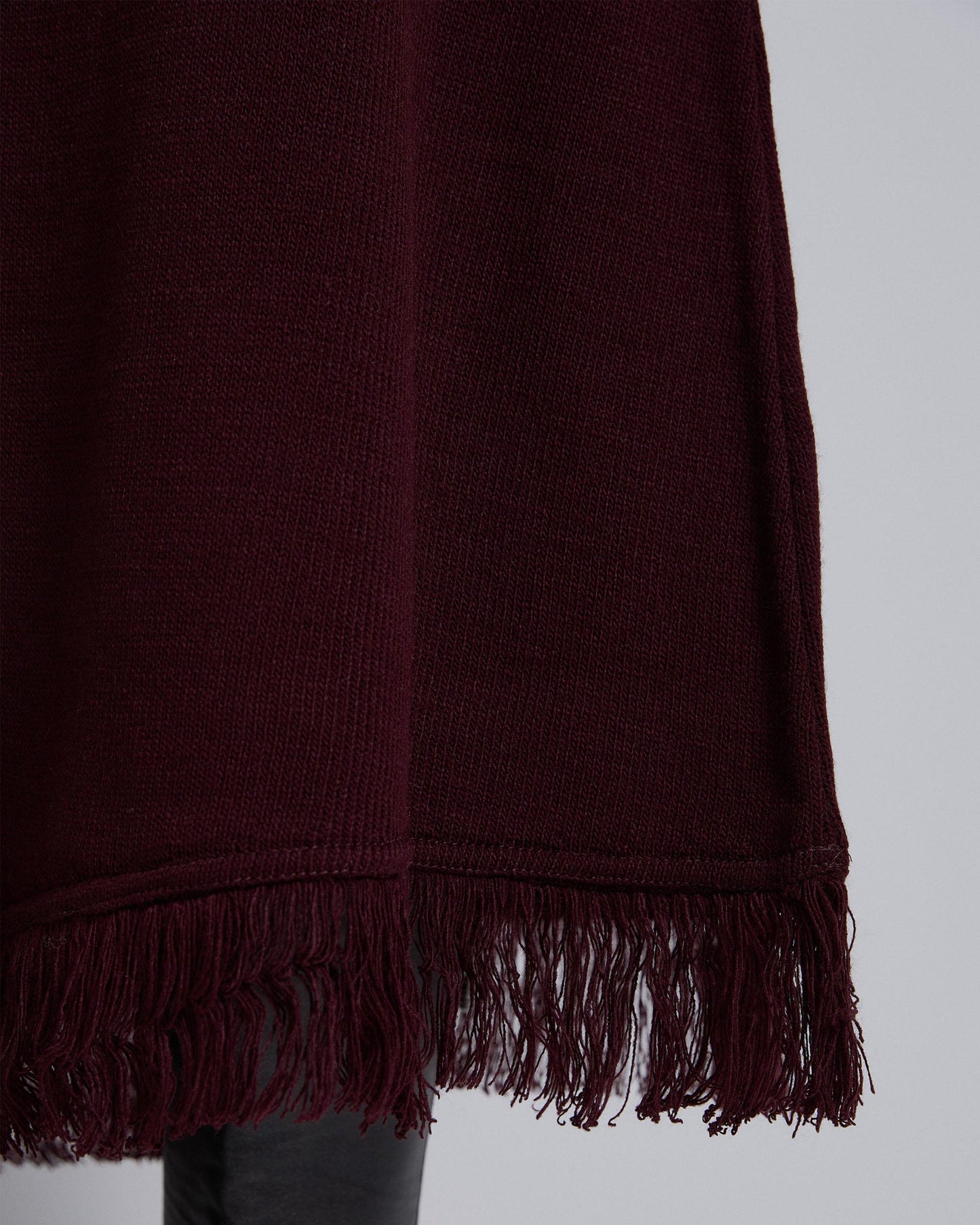 Falda Punto Asimetrica Flecos Morado